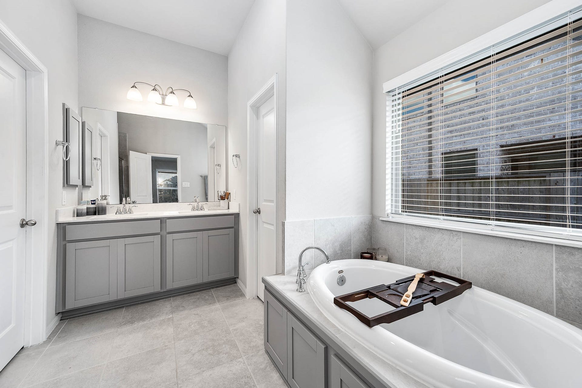 3707 Amoroso Drive, Iowa Colony, TX 77583 Getting ready or winding down? The Primary Bath offers vanity space and a soaking tub for either end to your day.