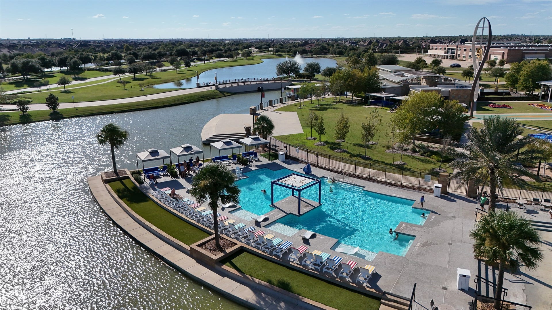 3707 Amoroso Drive, Iowa Colony, TX 77583 A pool day with a lake view...now that's a change of pace worth coming home to!