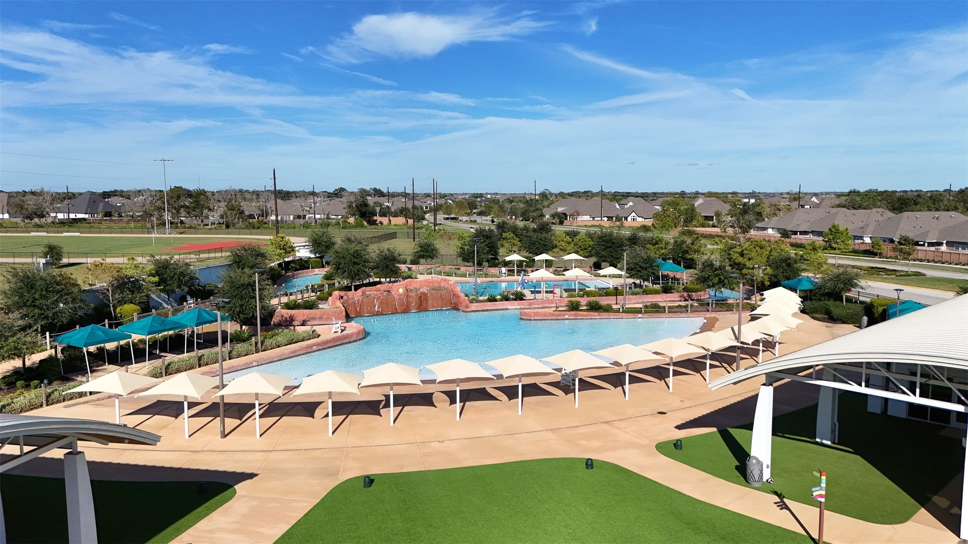 3707 Amoroso Drive, Iowa Colony, TX 77583 Pack the sunscreen! A gorgeous pool deck and shaded seating set the scene for a fun day.