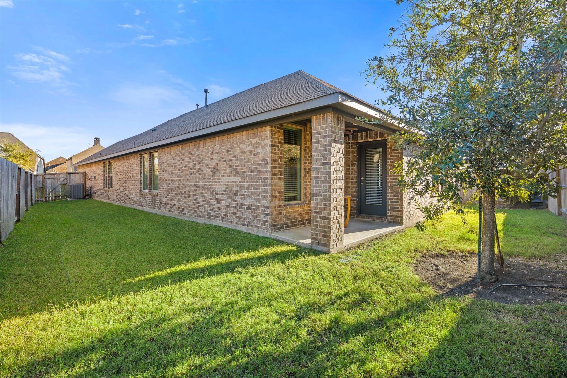 3707 Amoroso Drive, Iowa Colony, TX 77583 Enjoy a coffee or a sunset on the cozy covered rear patio.