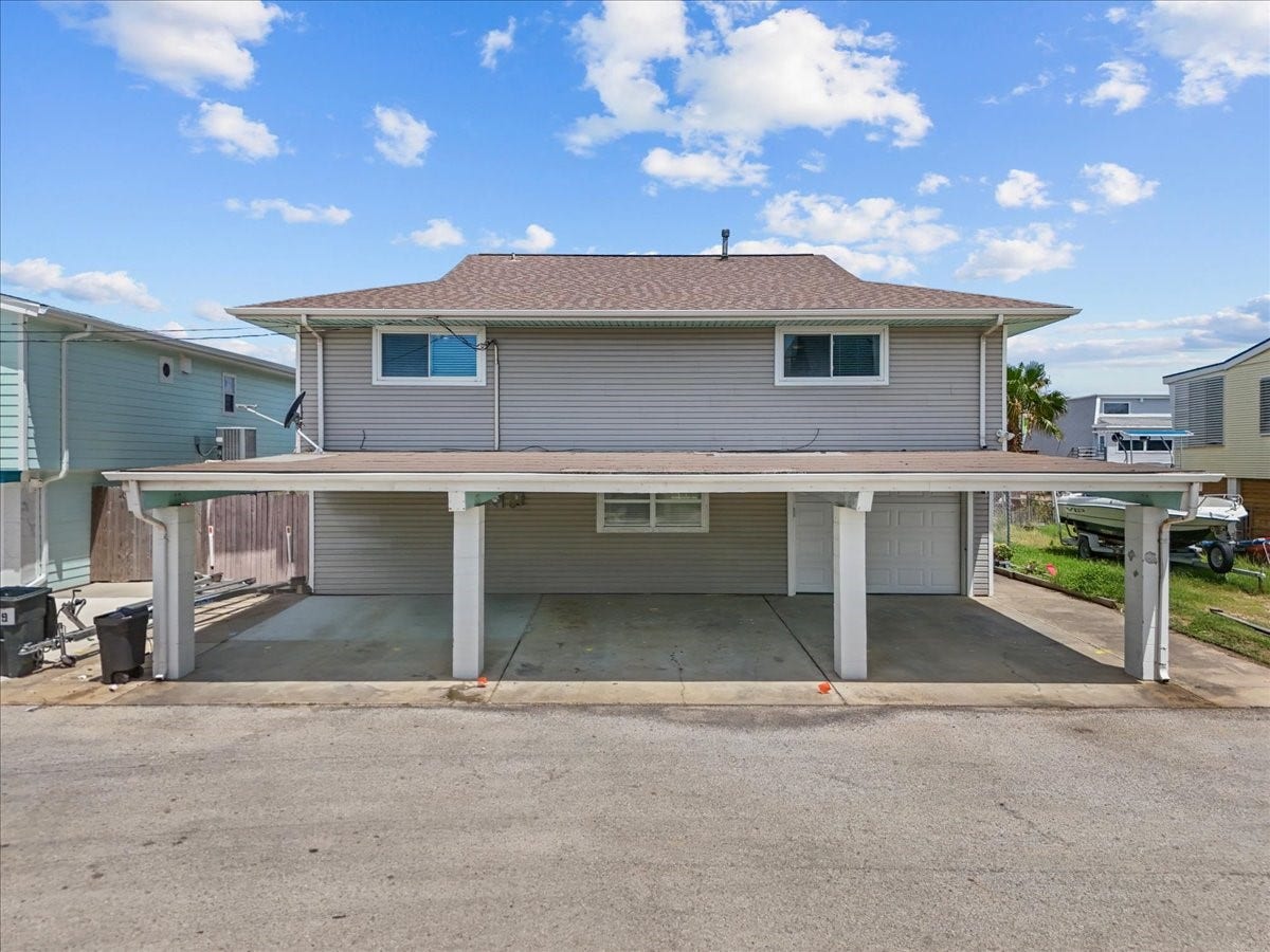 218 BARRACUDA Street, Bayou Vista, TX 77563 3 car carport