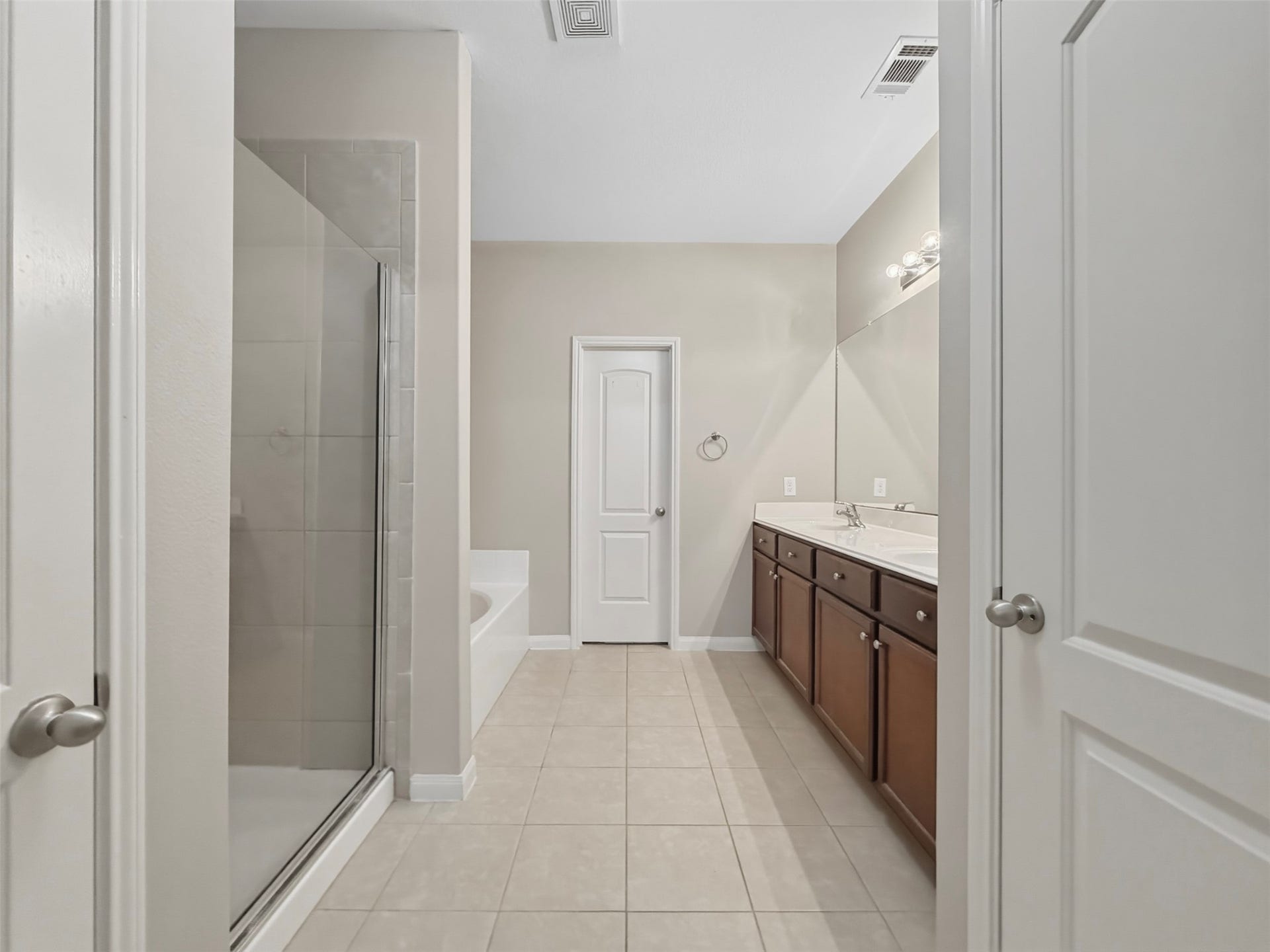 419 Turquoise Trade Drive, La Marque, TX 77568 Walking into the Primary Bathroom, youll see the door to the private water closet and sinks/vanity on the right. The first door to the left is a linen closet.