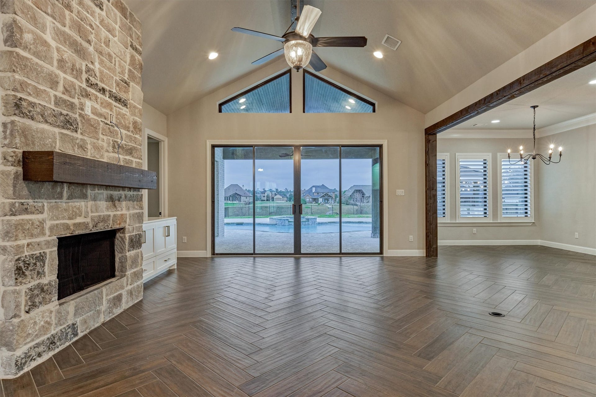 11618 Renaissance Drive, Montgomery, TX 77356 Sliding glass doors open to the pool and patio area.