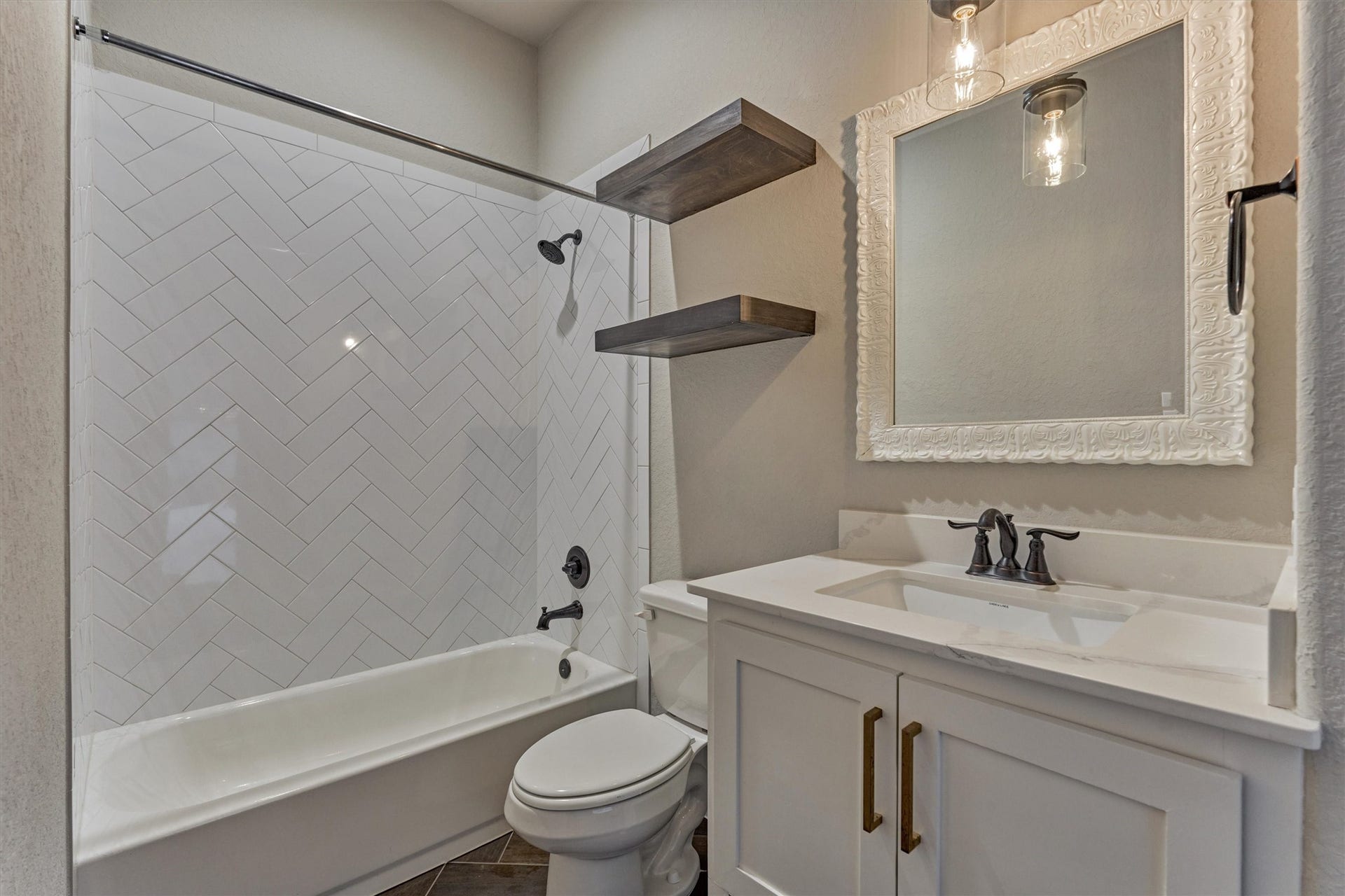 11618 Renaissance Drive, Montgomery, TX 77356 Ensuite bath with door access to the pool area for a convenient pool bath.