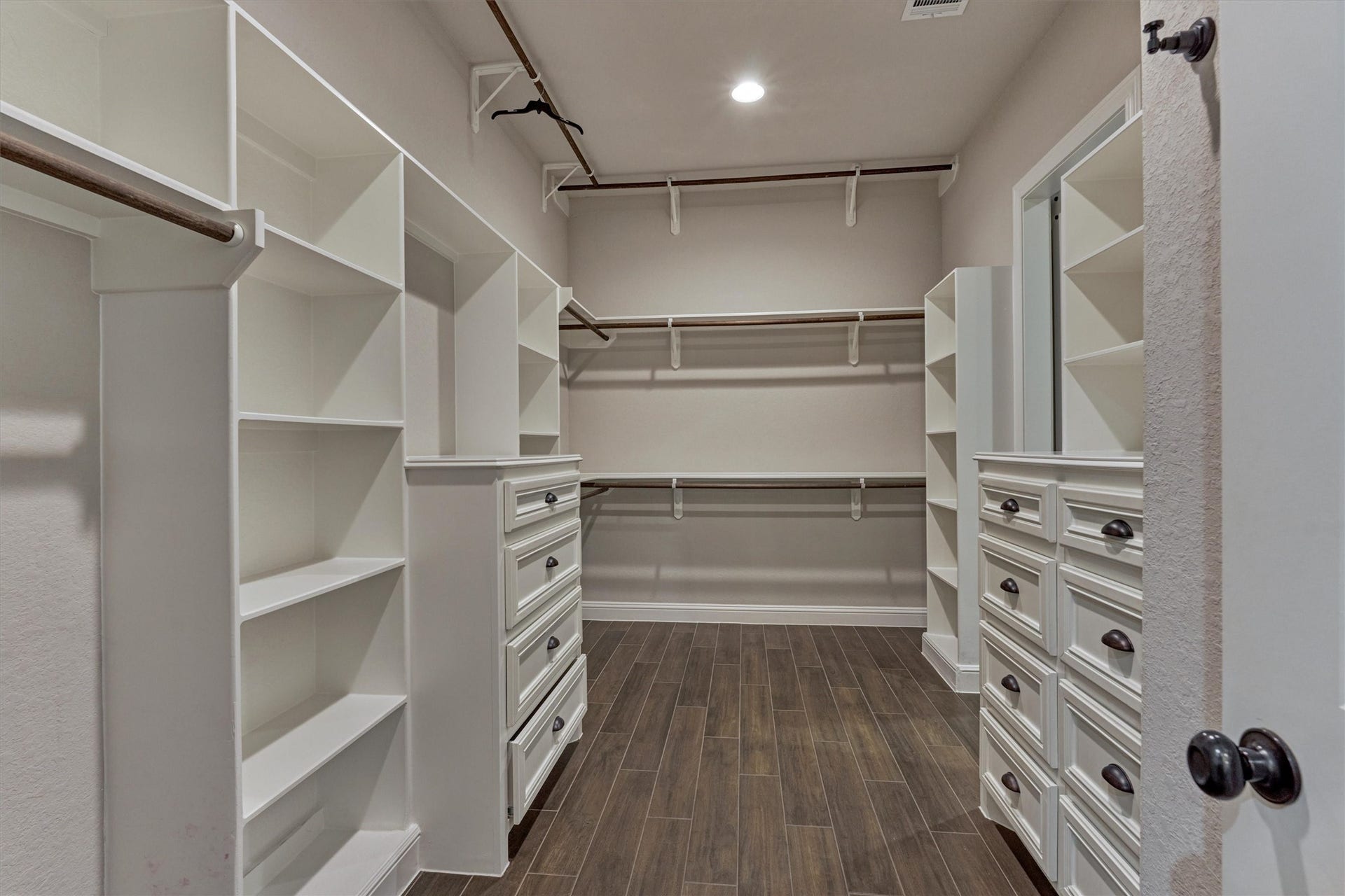 11618 Renaissance Drive, Montgomery, TX 77356 Large primary closet with plenty of built-ins.