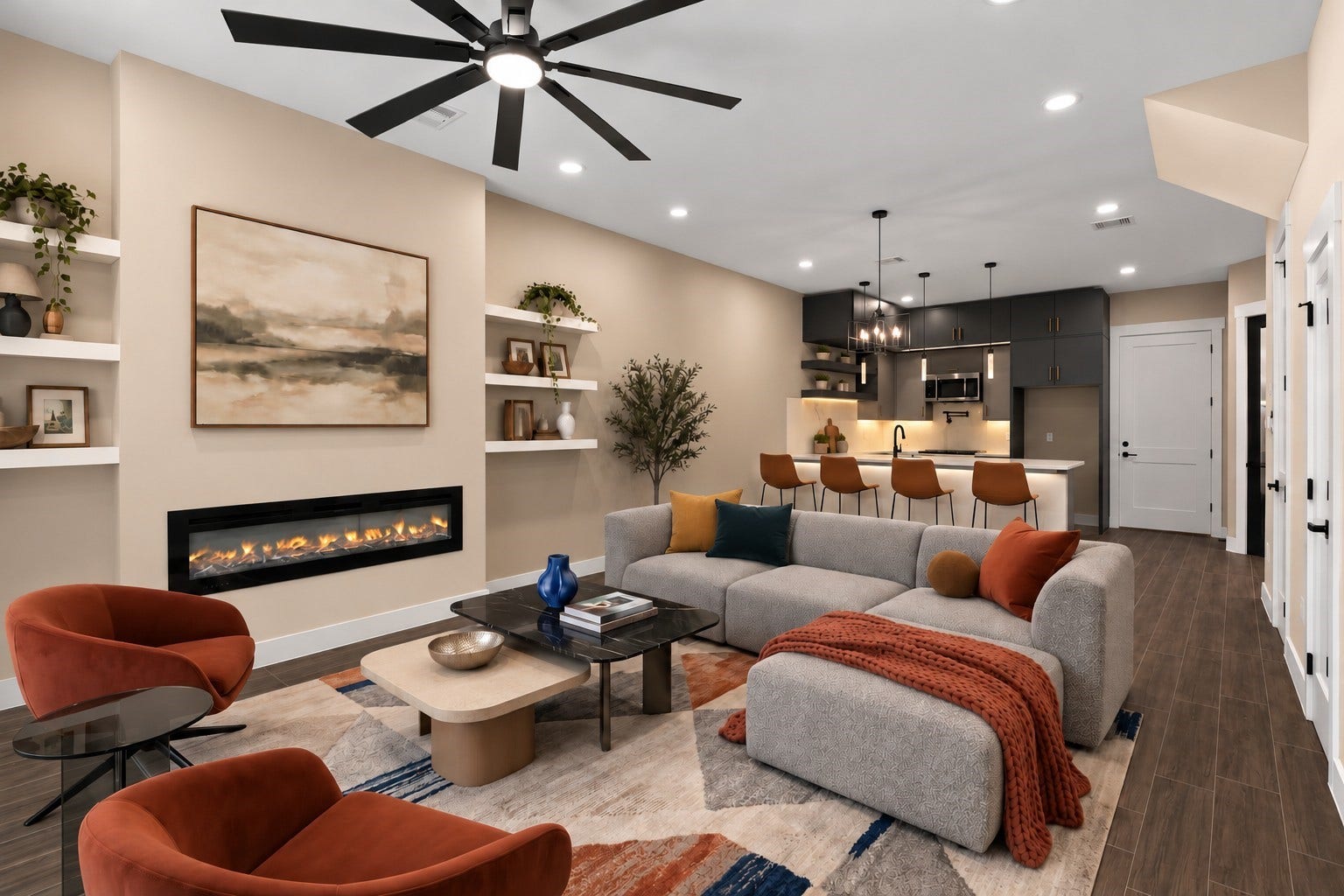 2412 Terry Street, #B, Houston, TX 77009 Virtually Staged: Offering a warm and inviting footprint, this main living area highlights clean architectural lines and integrated features. Built-in display shelving frames a ribbon fireplace, adding sophisticated style to the main seating area.