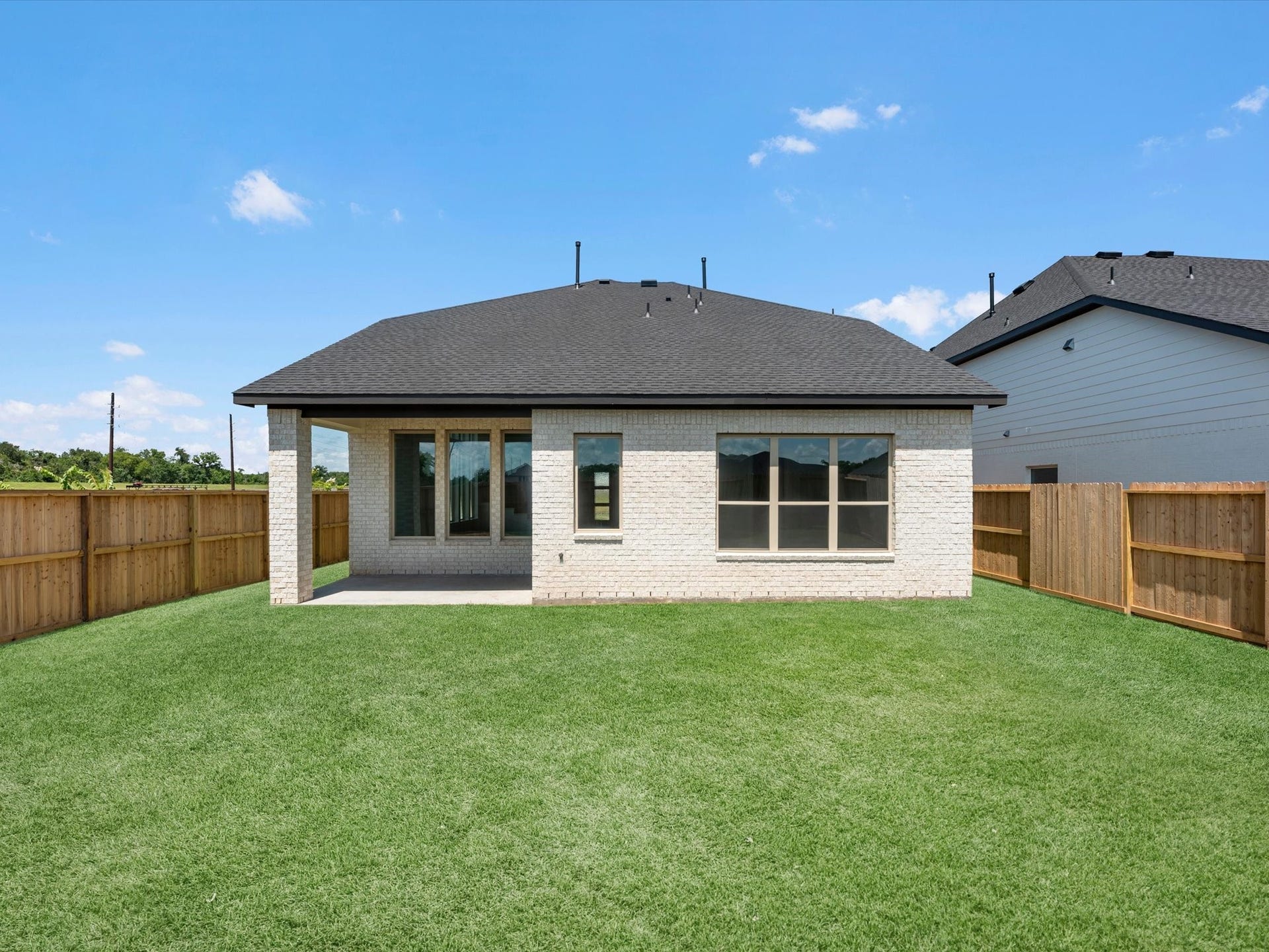 1106 Mills Cove Drive, Missouri City, TX 77459 Grass is digitally enhanced.