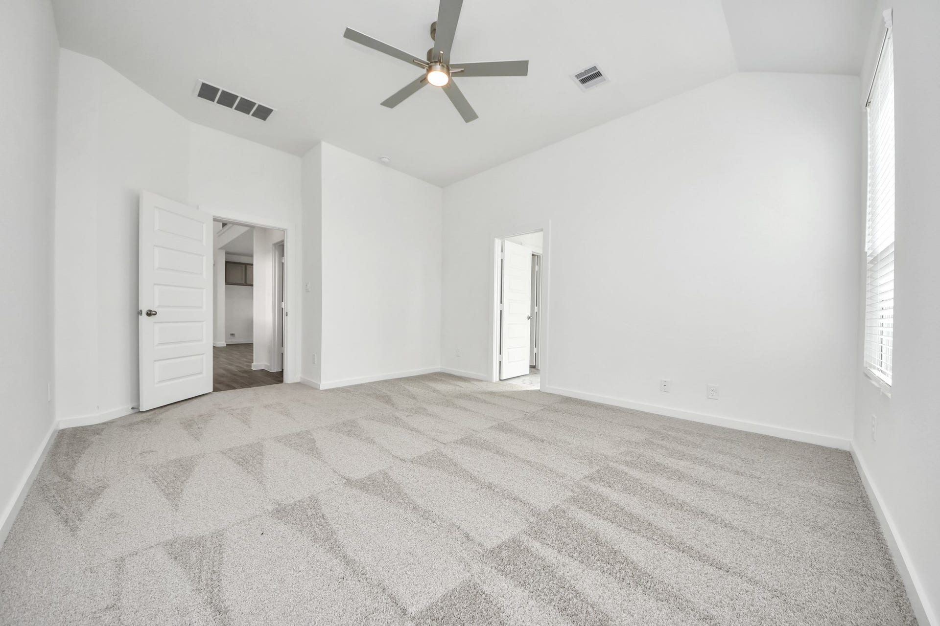 16006 Sycamore Maple Lane, Cypress, TX 77429 Come and unwind after a long day in this magnificent primary suite! This spacious room features plush carpet, warm paint, high ceilings and large windows with privacy blinds. Sample photo of completed home with similar floor plan. Actual colors and selections may vary.
