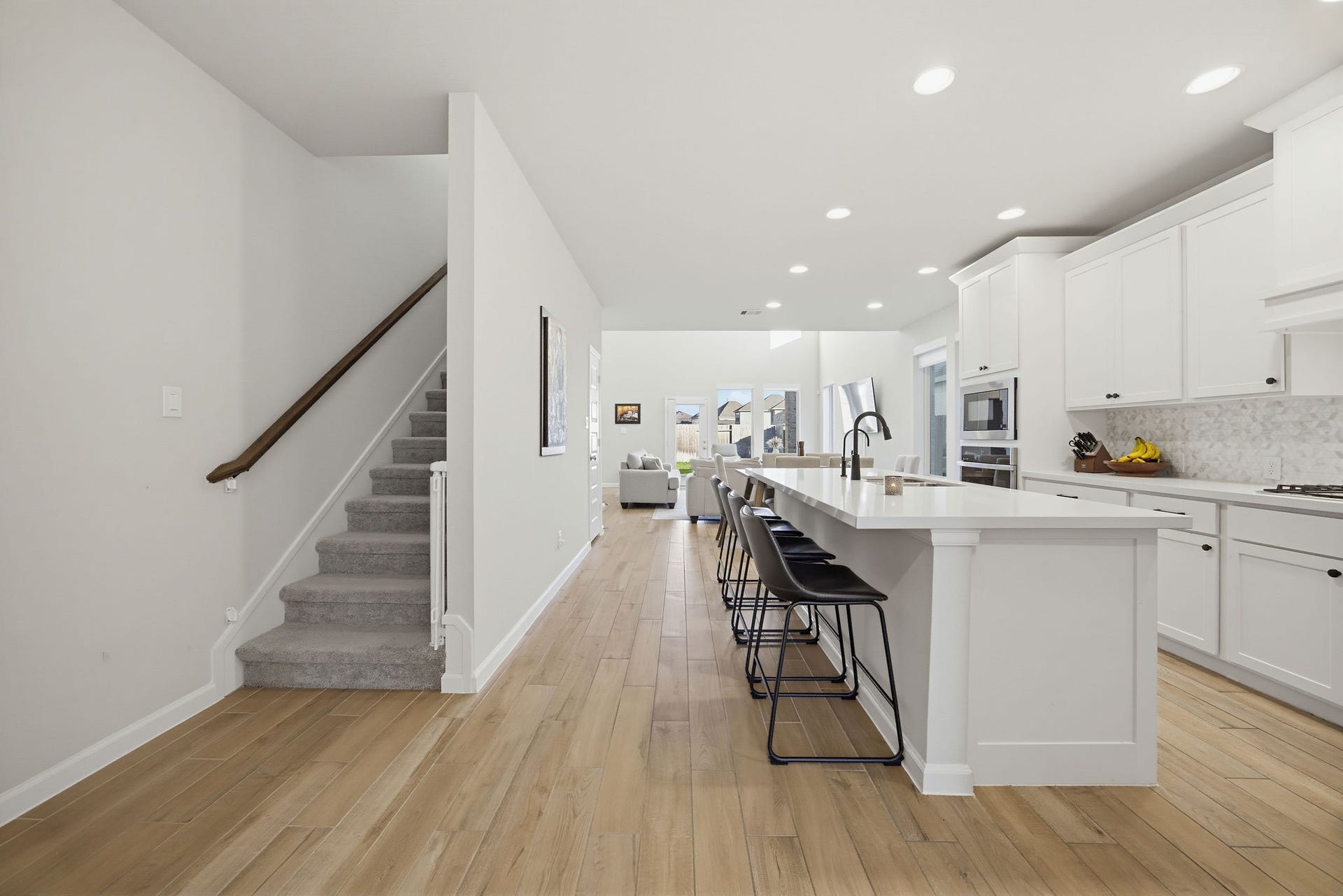 9710 Keeper Drive, Missouri City, TX 77459 Bright and open kitchen/dinning/living room