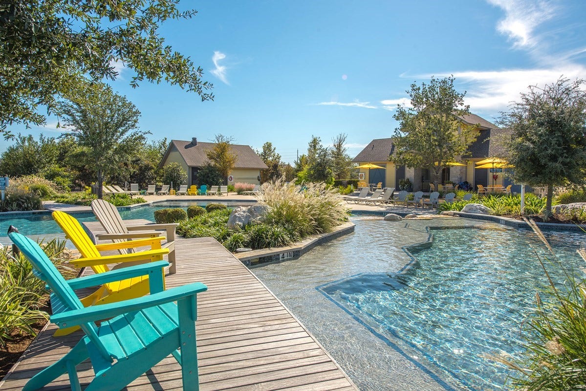 10718 Hidden Rock Drive, Missouri City, TX 77459 Sawmill Lake Club offers a resort-style pool setting designed for relaxing, gathering with friends and enjoying sunny Texas days close to home.