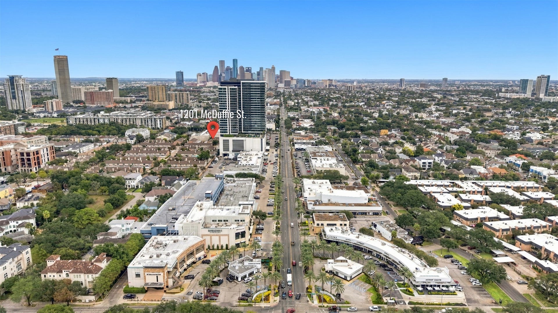 1201 Mcduffie Street, #212, Houston, TX 77019 Prime location in a vibrant urban setting, offering proximity to downtown amenities, shopping, and dining with a clear view of the city skyline.