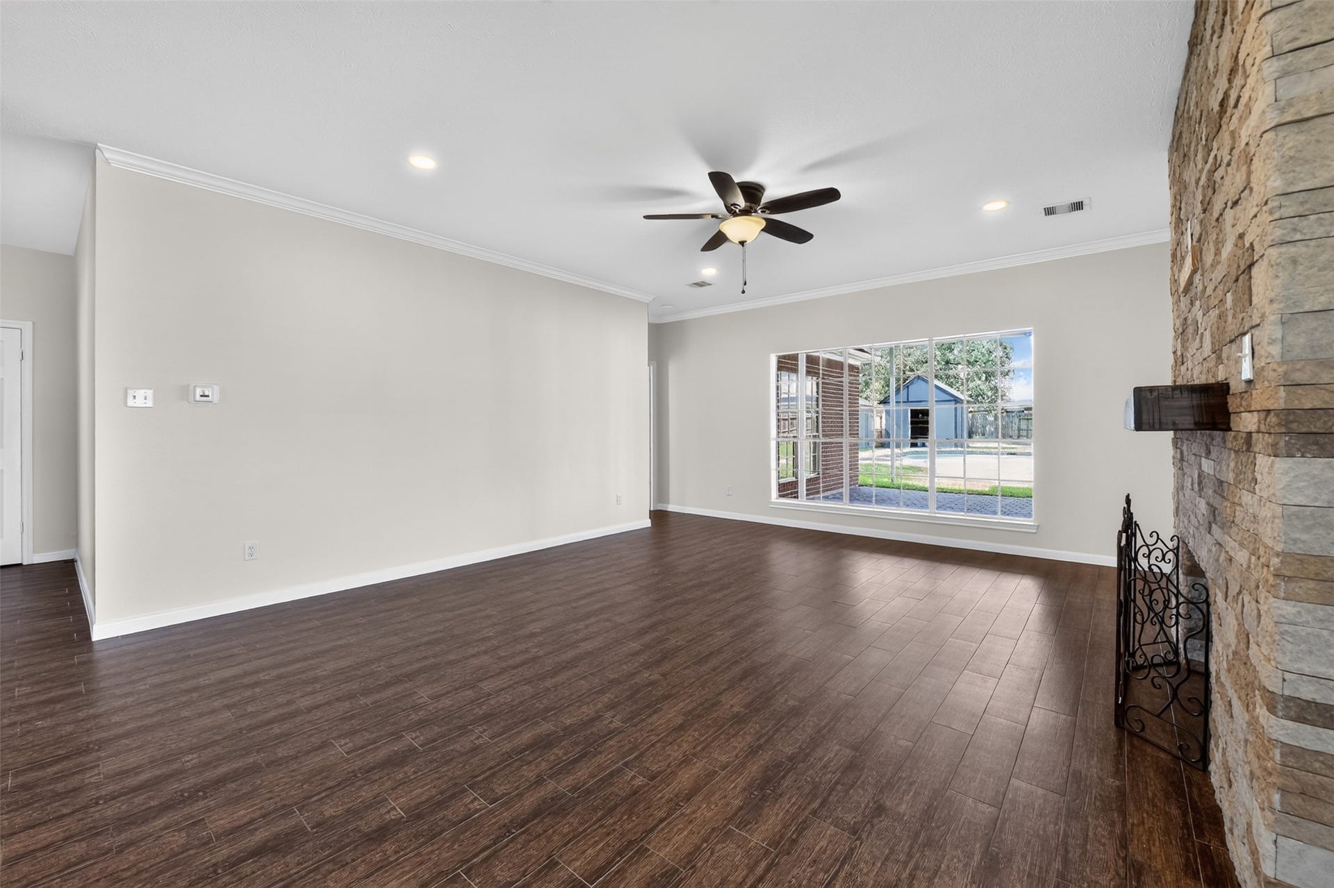 Living area overlooks backyard.