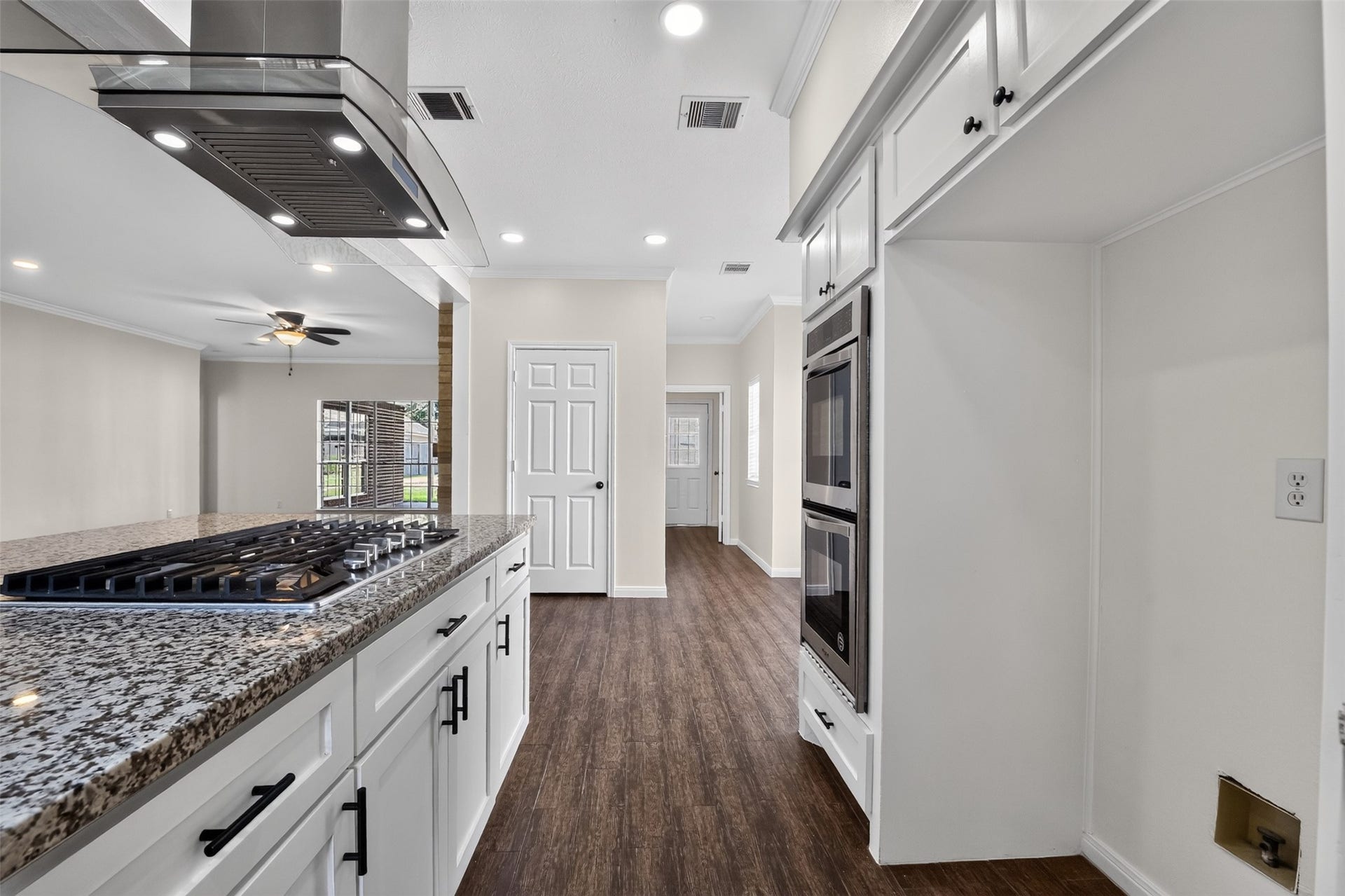 Kitchen facing utility room.