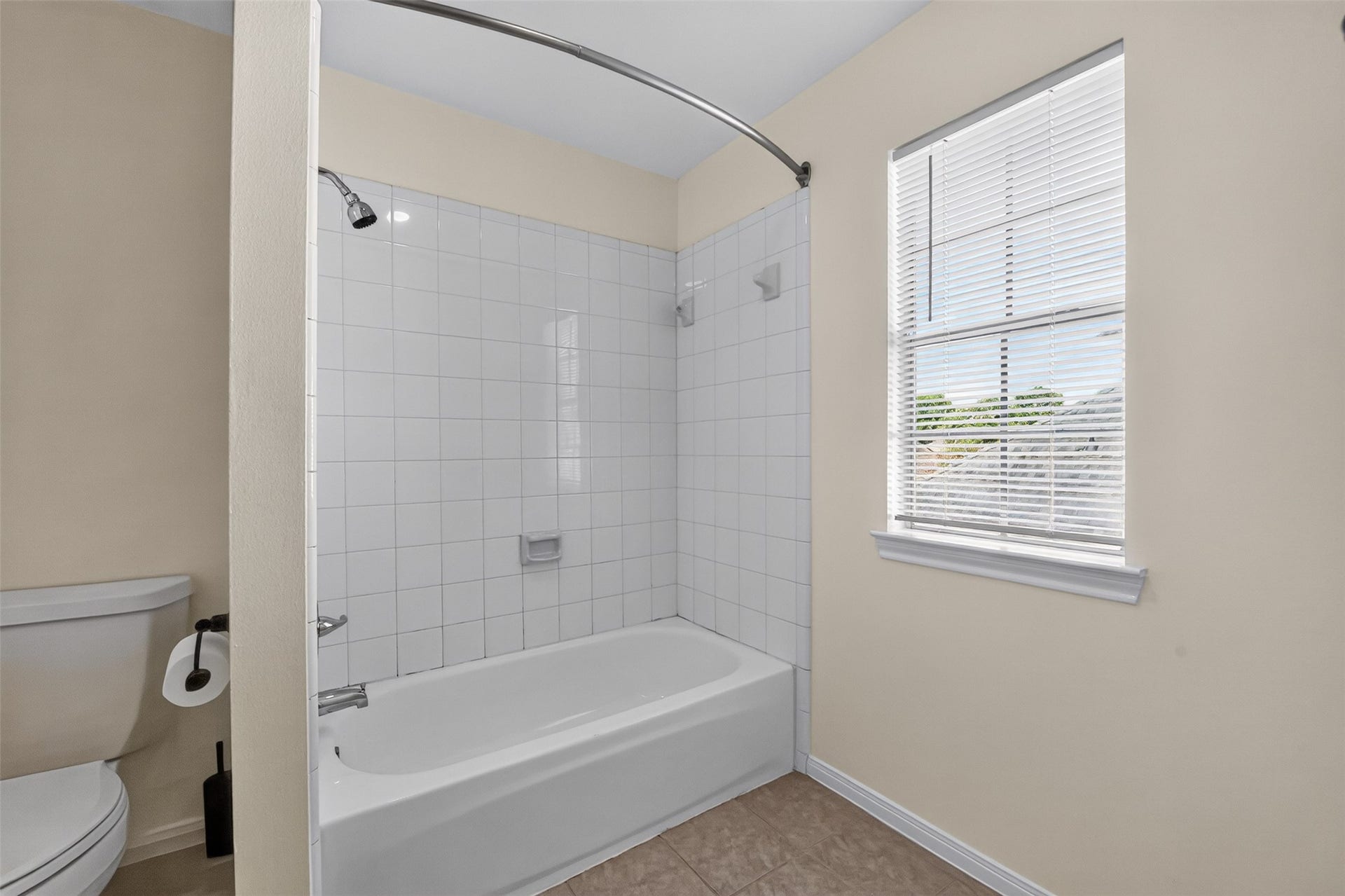 Secondary bathroom with tub/shower condo.