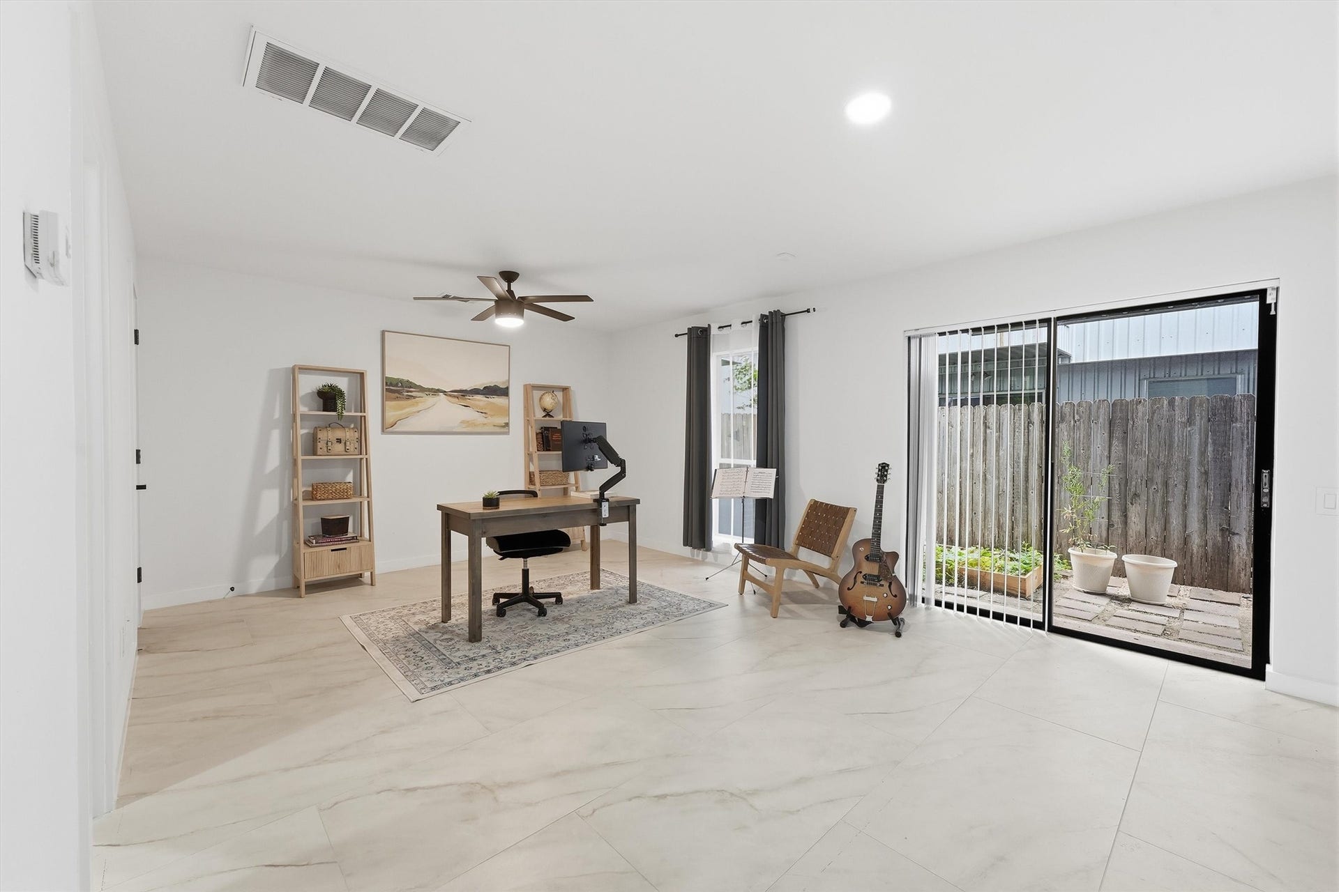 Huge guest room on the first floor with ensuite bathroom. Great space for a home office or a roommate.