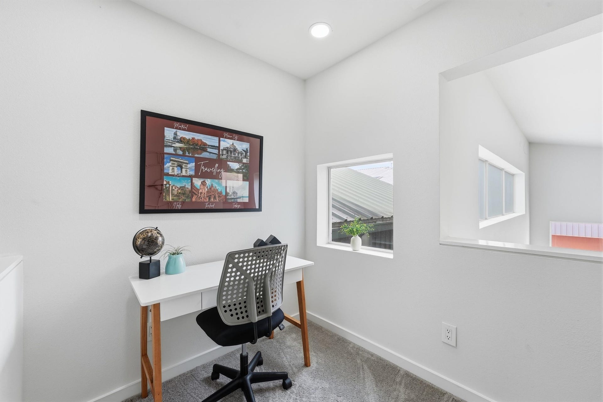Cute bonus room adjacent to the primary bedroom. Imagine the possibilities! You'd look great on Zoom here. (See all that natural light?) You could outfit the bonus room as a coffee bar to start your day or a wine bar to end it. This space would make a great hobby room.