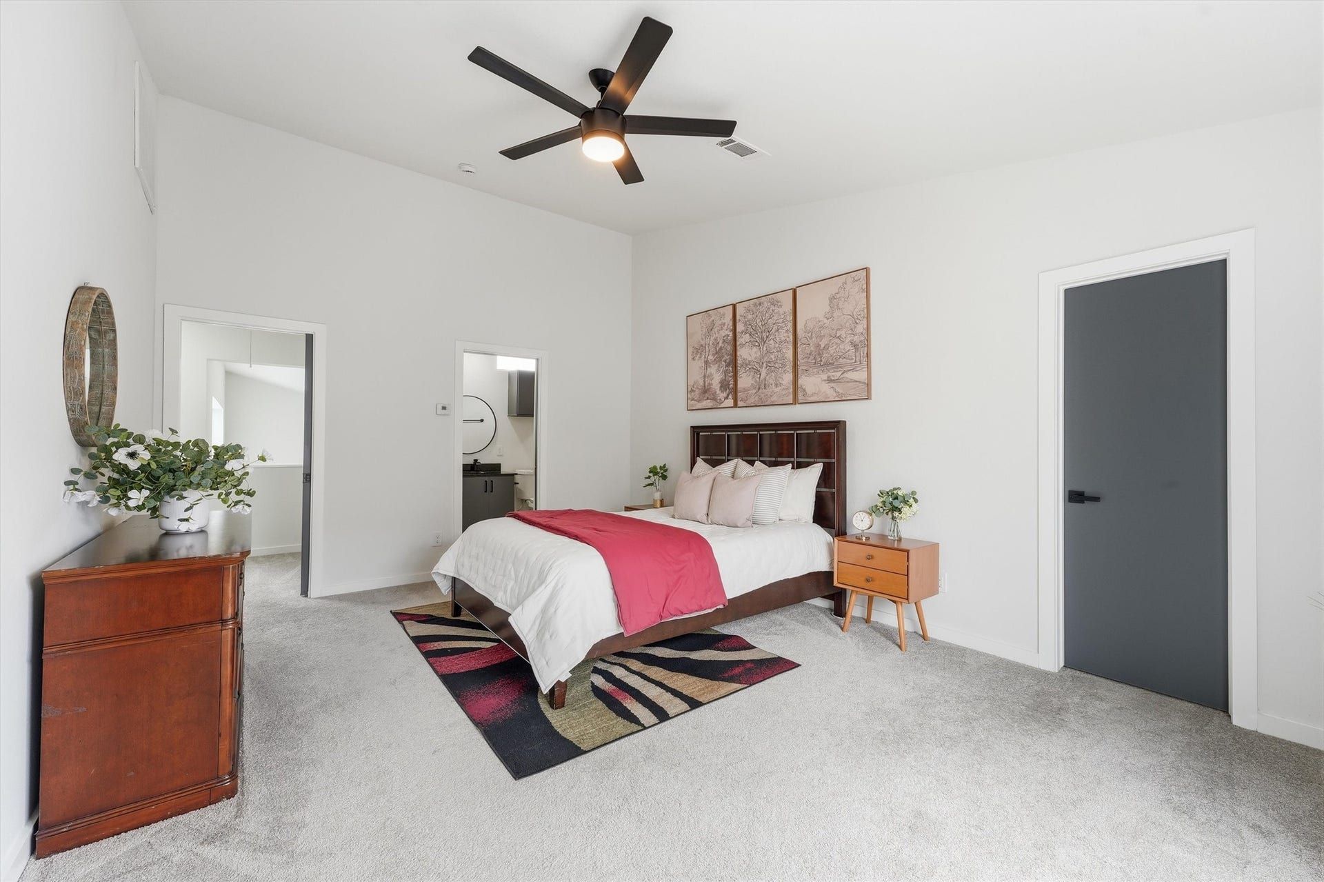 Private primary suite on the third floor features vaulted ceiling and a large walk-in closet. Notice the bonus room in the corner.