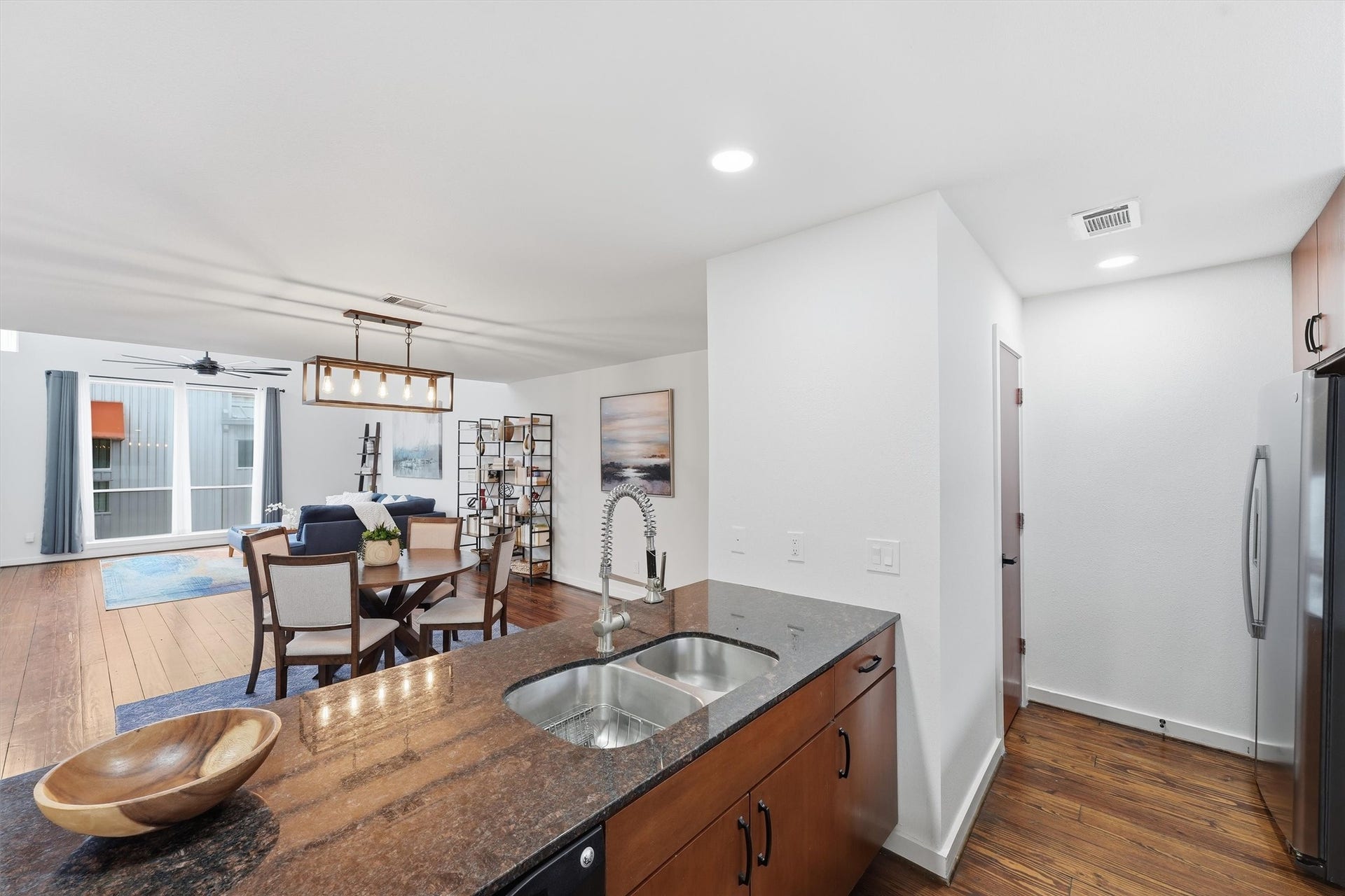 Light and bright. You'll find the perfect space to host your friends and family in this spacious second floor open-concept living/dining/kitchen