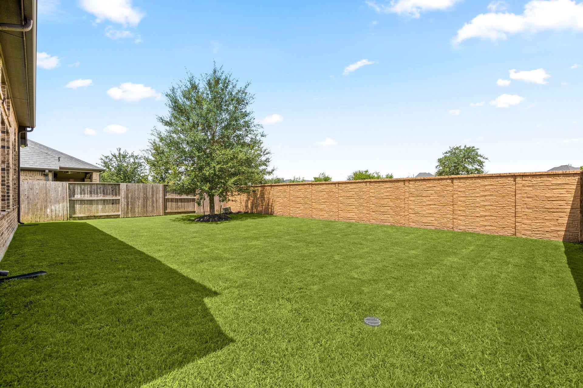6922 Goldstrum Way, Katy, TX 77493 A generous stretch of lawn and fencing along the rear of the property reinforce the private, no-back-neighbor setting this home offers.