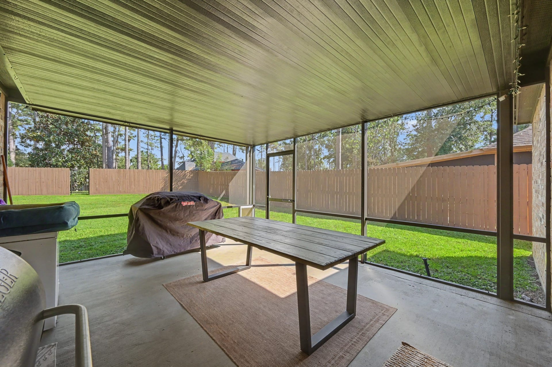 14010 Jamaica Circle, Willis, TX 77318 Spacious screened back porch