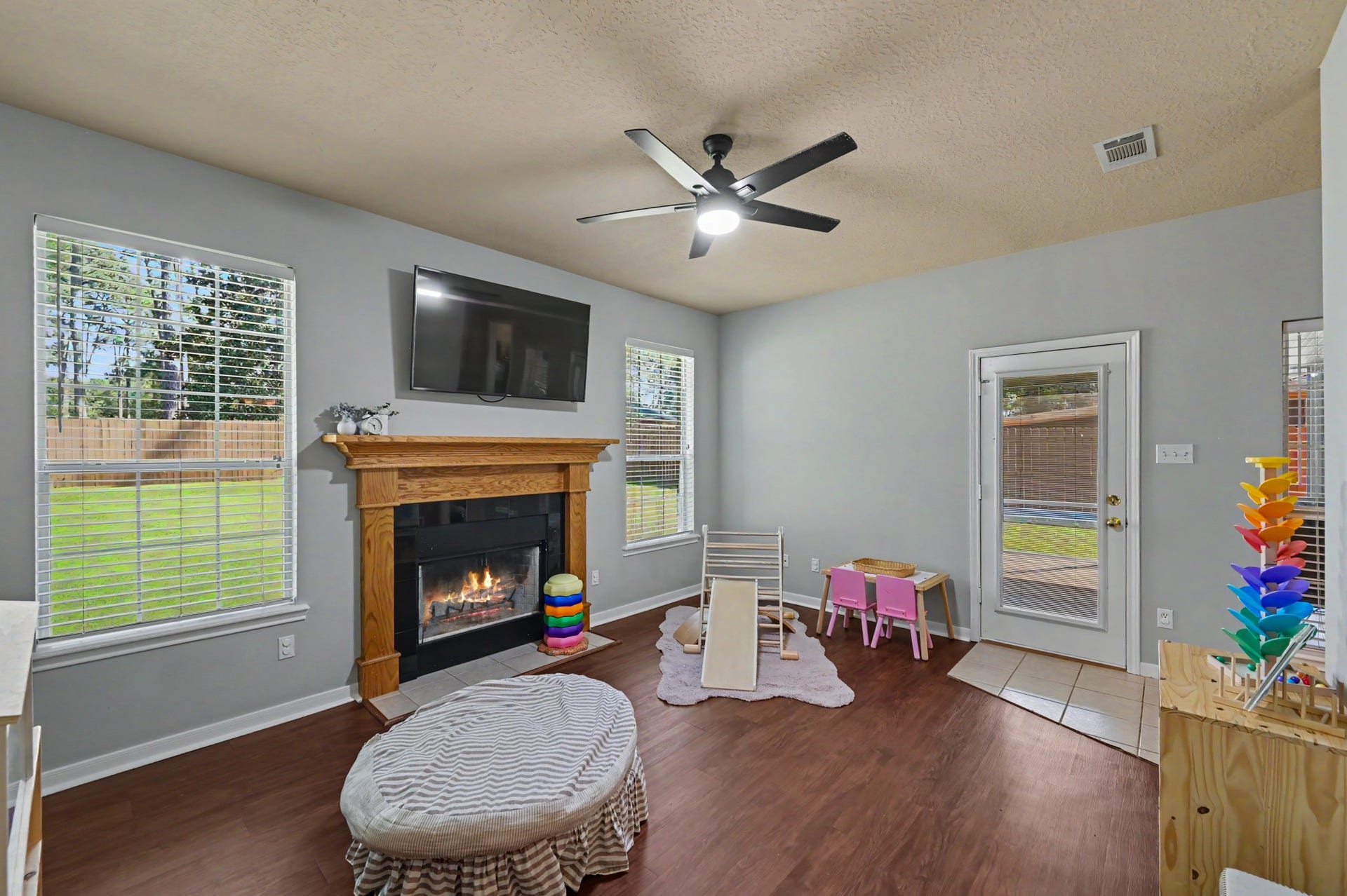 14010 Jamaica Circle, Willis, TX 77318 Secondary living room with wood fireplace