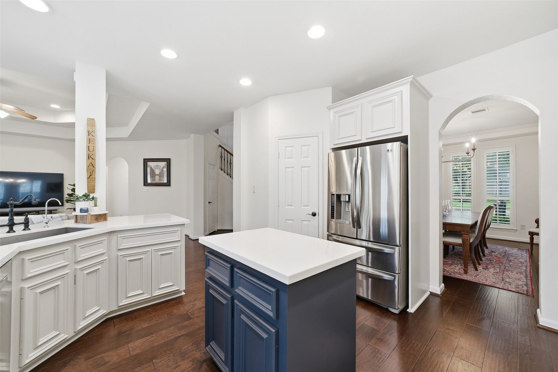 2815 Golden Larch Drive, Katy, TX 77494 The walk-in pantry is to the left of the refrigerator.