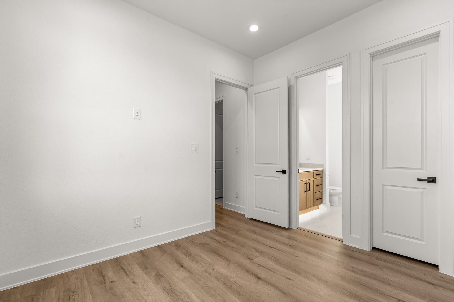 6714 Tierwester Street, Houston, TX 77021 Warm-toned flooring, crisp white finishes, and a functional layout create an inviting space that balances style with practicality.