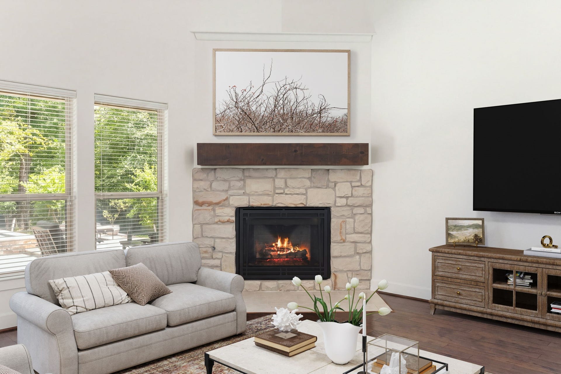 A beautiful stone fireplace featuring a convenient gas log insert serves as the heart of this home. It creates a warm, inviting ambience that is absolutely perfect for cozy evenings. *Virtually Staged