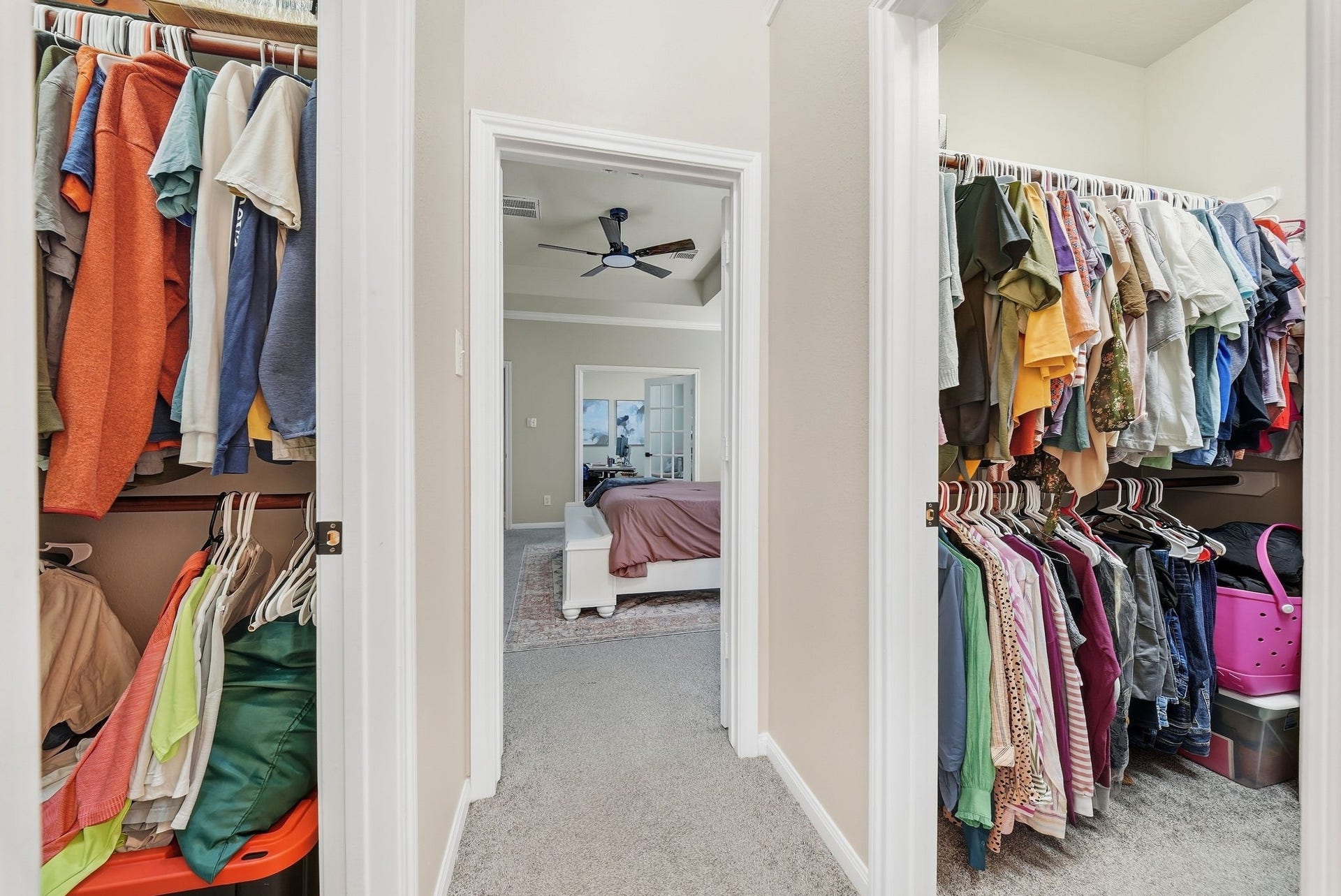 402 Prattwood Court, League City, TX 77573 Spacious walk-in closets with extensive hanging and storage space connecting to the primary bedroom.