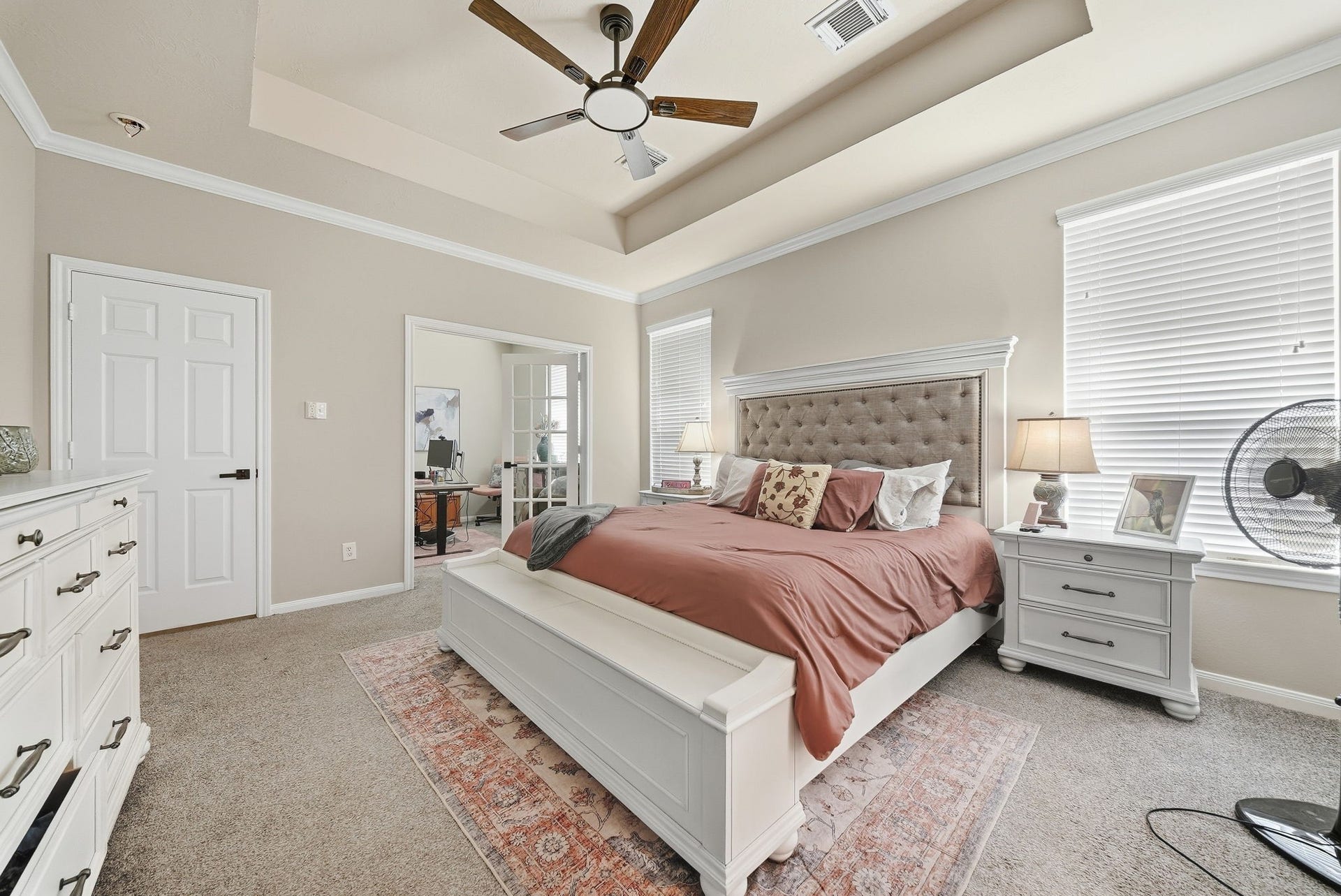 402 Prattwood Court, League City, TX 77573 The primary bedroom offers a functional, bright office space.