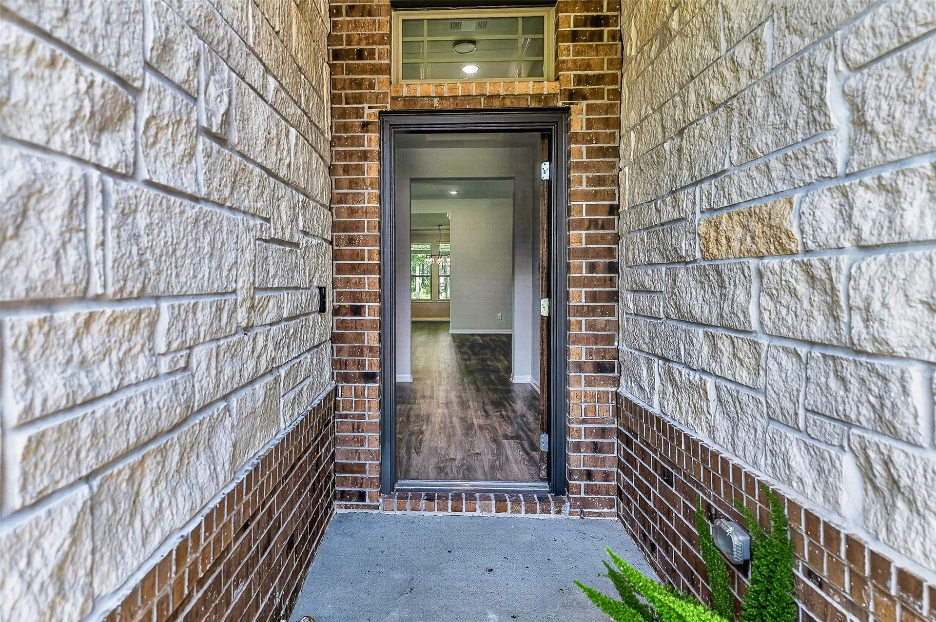 1295 Road 66112, Dayton, TX 77535 Entrance showing brick and rock combination