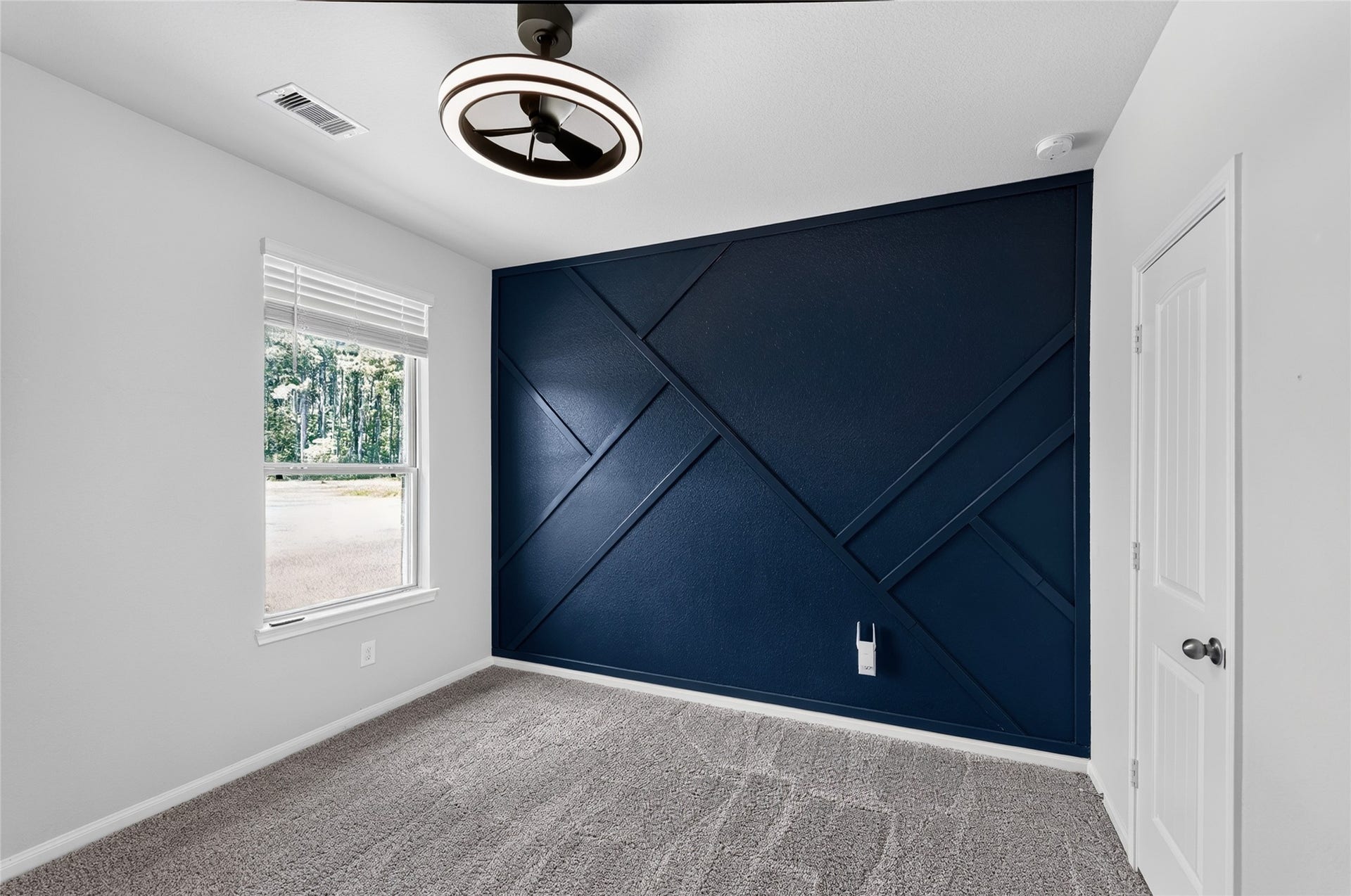1295 Road 66112, Dayton, TX 77535 Second room with accent wall