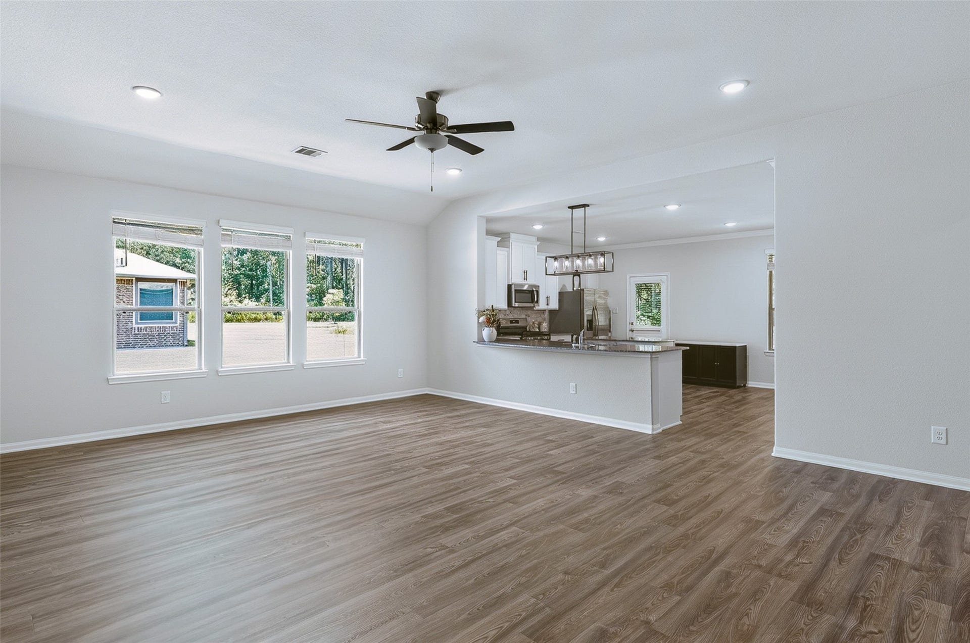 1295 Road 66112, Dayton, TX 77535 Living room & kitchen view