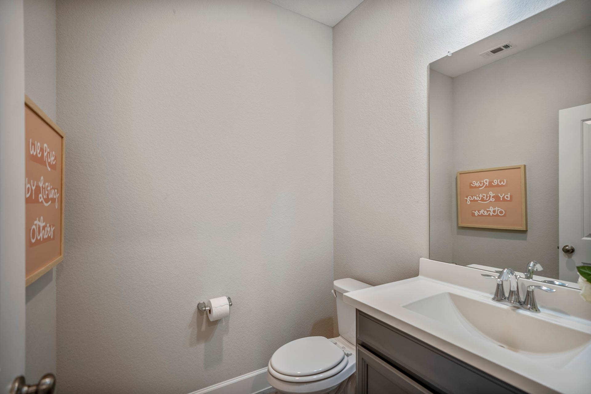 10615 Parkwood Court, Missouri City, TX 77459 Convenient upstairs powder bath ideally situated between the game room and media room, perfect for guests and everyday functionality. One of two powder baths in the home, this added feature offers both comfort and convenience for entertaining upstairs.