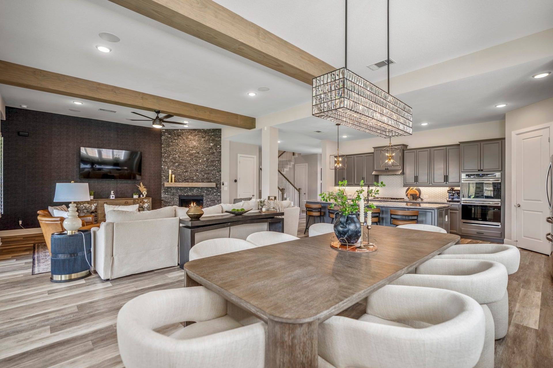 10615 Parkwood Court, Missouri City, TX 77459 Thoughtfully designed open-concept layout where the kitchen, dining, and living spaces all come together seamlessly, creating the perfect setup for entertaining and everyday living. The connected design, warm finishes, and spacious feel make the home both inviting and functional.
