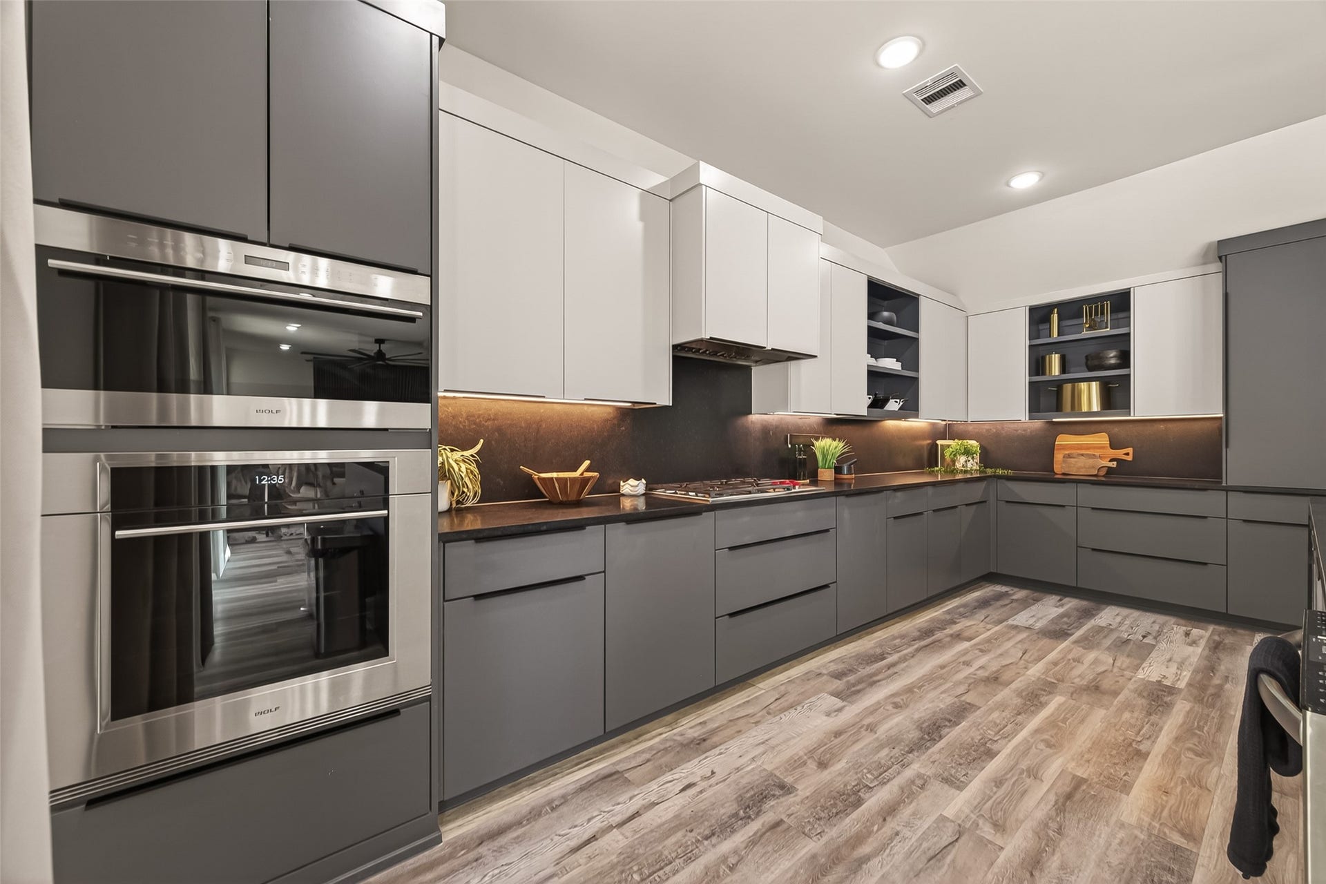 5422 Valerie Street, Bellaire, TX 77401 This kitchen features stainless steel appliances and ample counter space, creating a welcoming and functional space that invites you to spend time cooking, gathering, and enjoying every moment in the heart of the home.