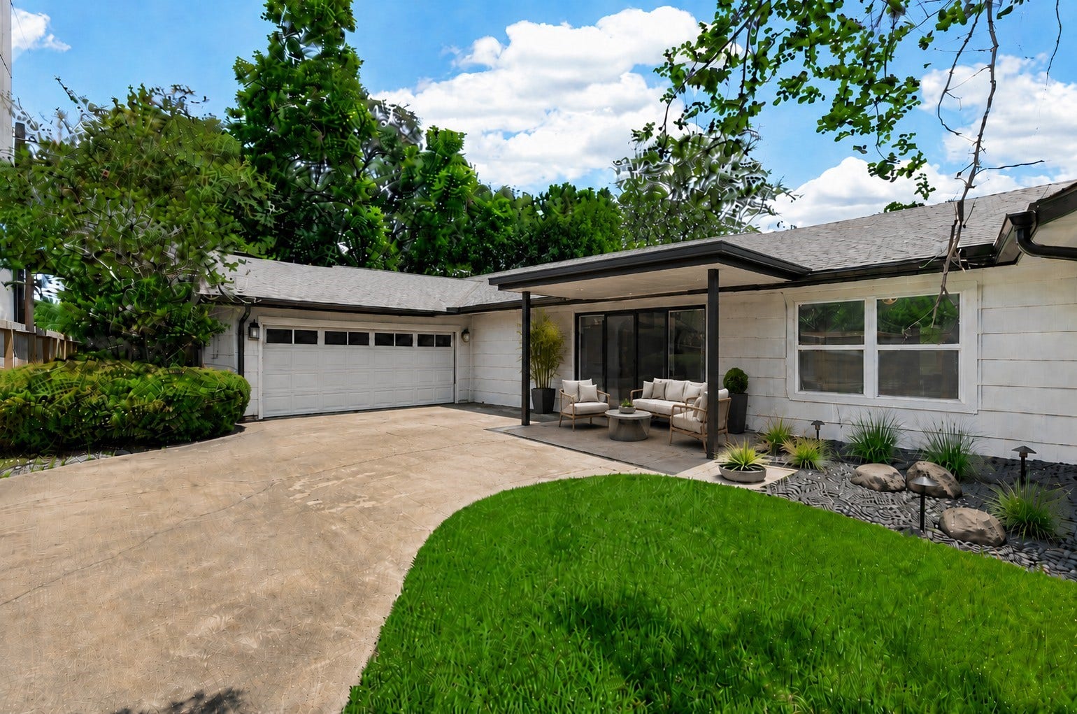 5422 Valerie Street, Bellaire, TX 77401 Virtual rendering showing one possible use for the west side of the property. This area currently includes a covered carport and fenced side driveway, offering flexibility for future use. The rendering illustrates how the carport could potentially be enclosed and converted into a garage, while also creating a small covered patio or lounge area just outside the primary bedroom. With outdoor seating, greenery, and a peaceful garden-style setting.