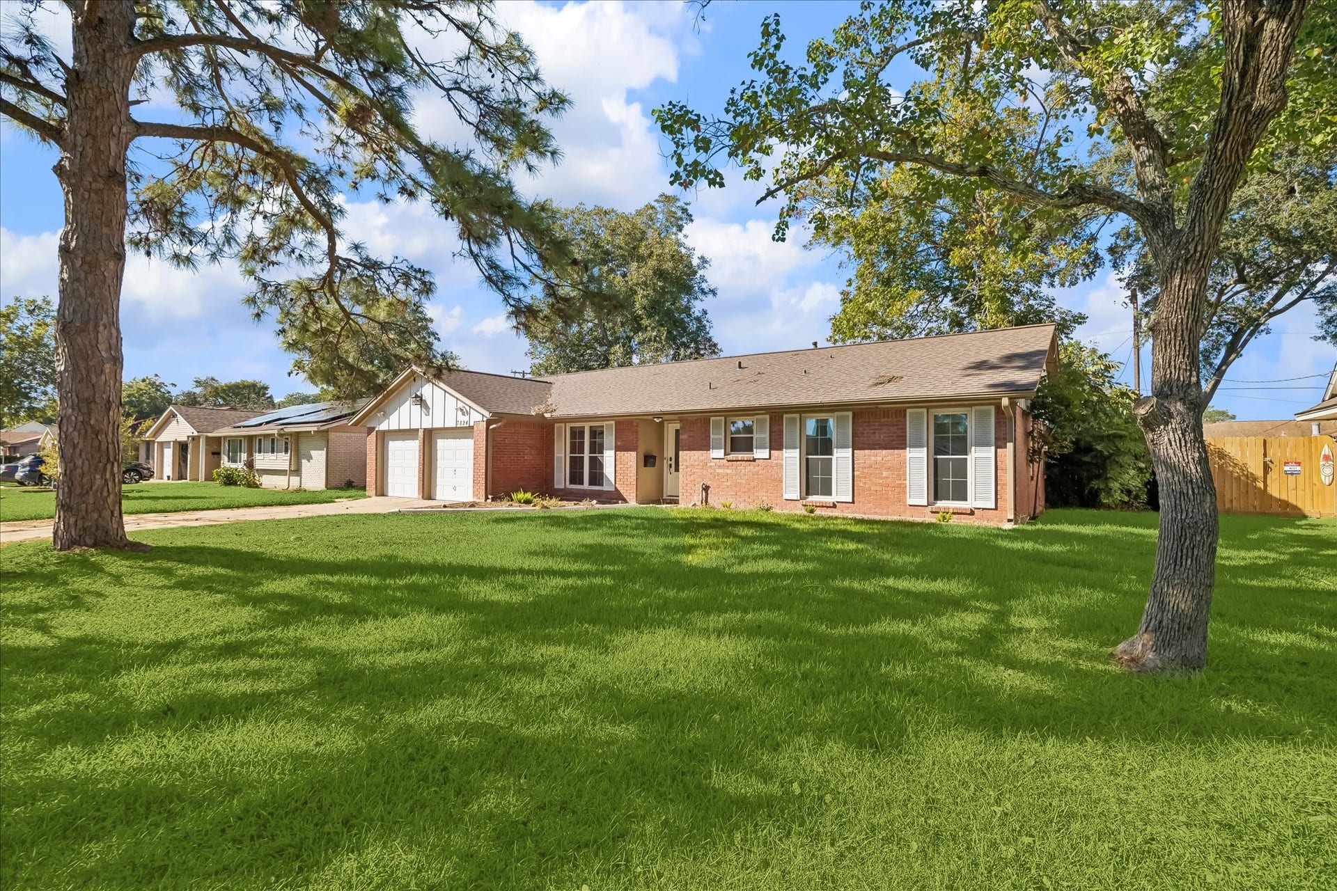 7824 Yucca Drive, Texas City, TX 77591 Another view of the front of the home with a nice lot and mature trees.