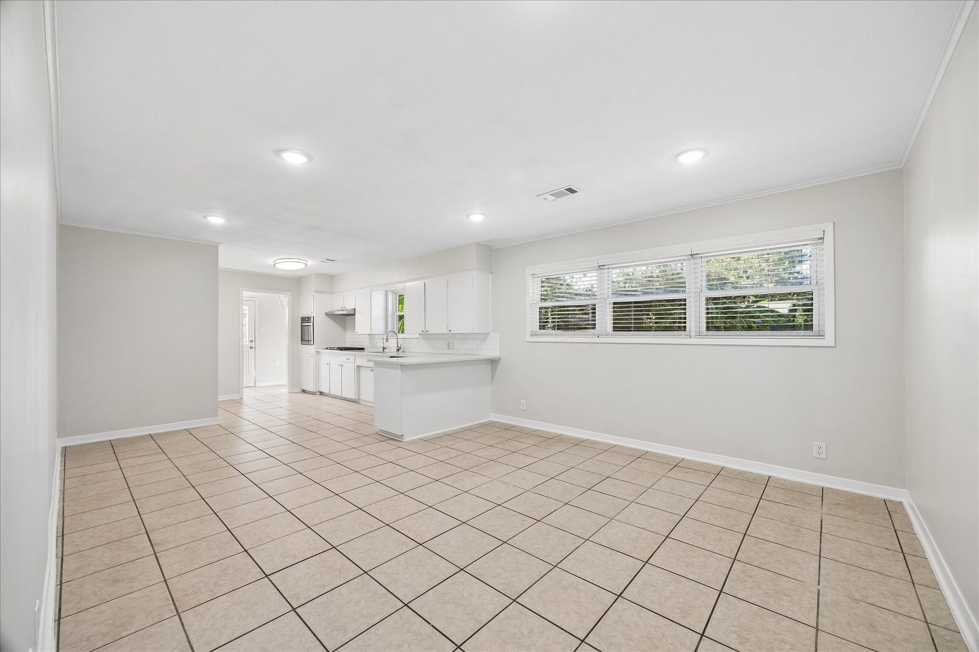 7824 Yucca Drive, Texas City, TX 77591 The kitchen is spacious and has endless possibilities. Set up a family gathering area and small breakfast space or a full dining room.