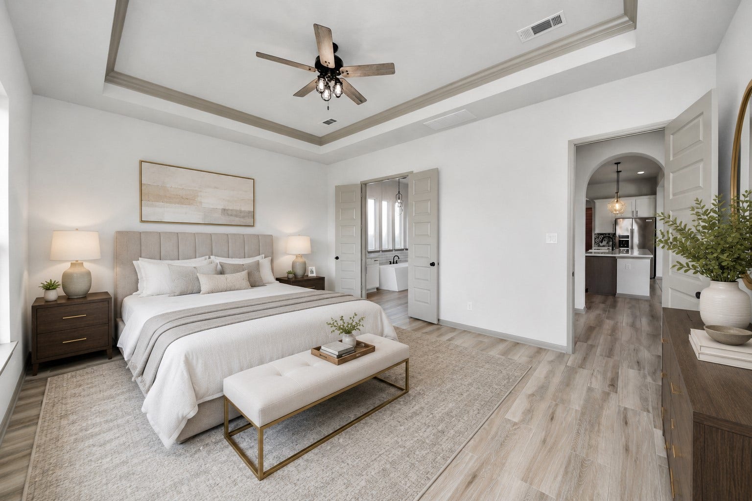 1423 Hackberry Heights Drive, Richmond, TX 77406 The room flows seamlessly into a stylish ensuite bathroom and offers easy access to the kitchen.
