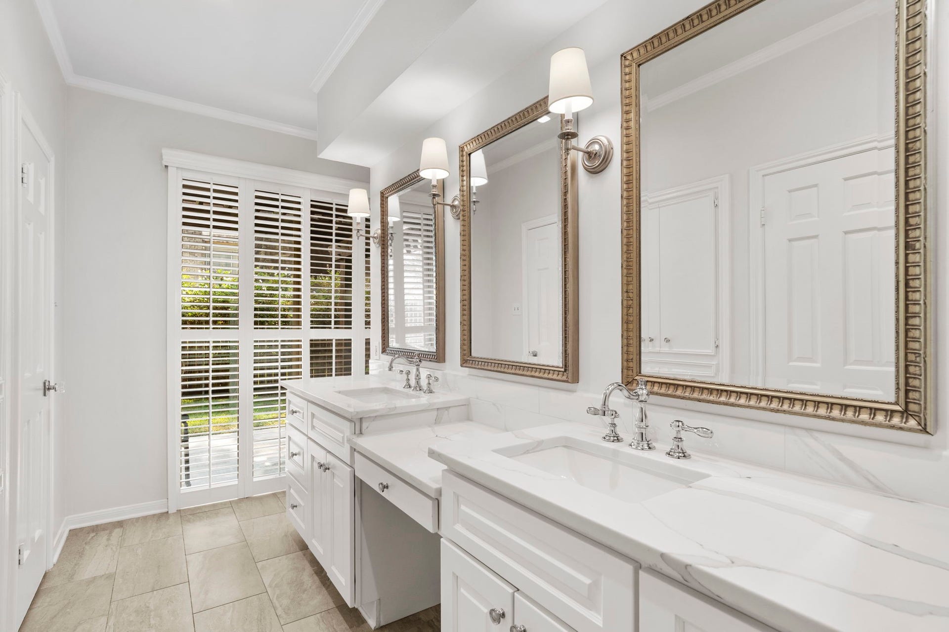 443 Fox Briar Lane, Sugar Land, TX 77478 Beautifully renovated, the owners bath feels like a private retreat with a generous dual vanity, deep soaking tub, and separate glass-enclosed shower.