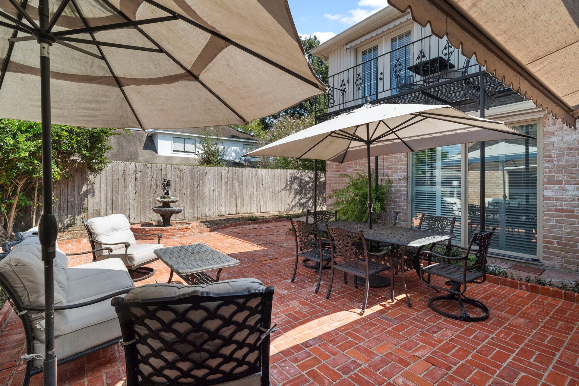 443 Fox Briar Lane, Sugar Land, TX 77478 The perfect setting for al fresco dining and outdoor entertaining, with a recently refurbished awning featuring a retractable shade that lets you adjust the amount of sunlight and shade.