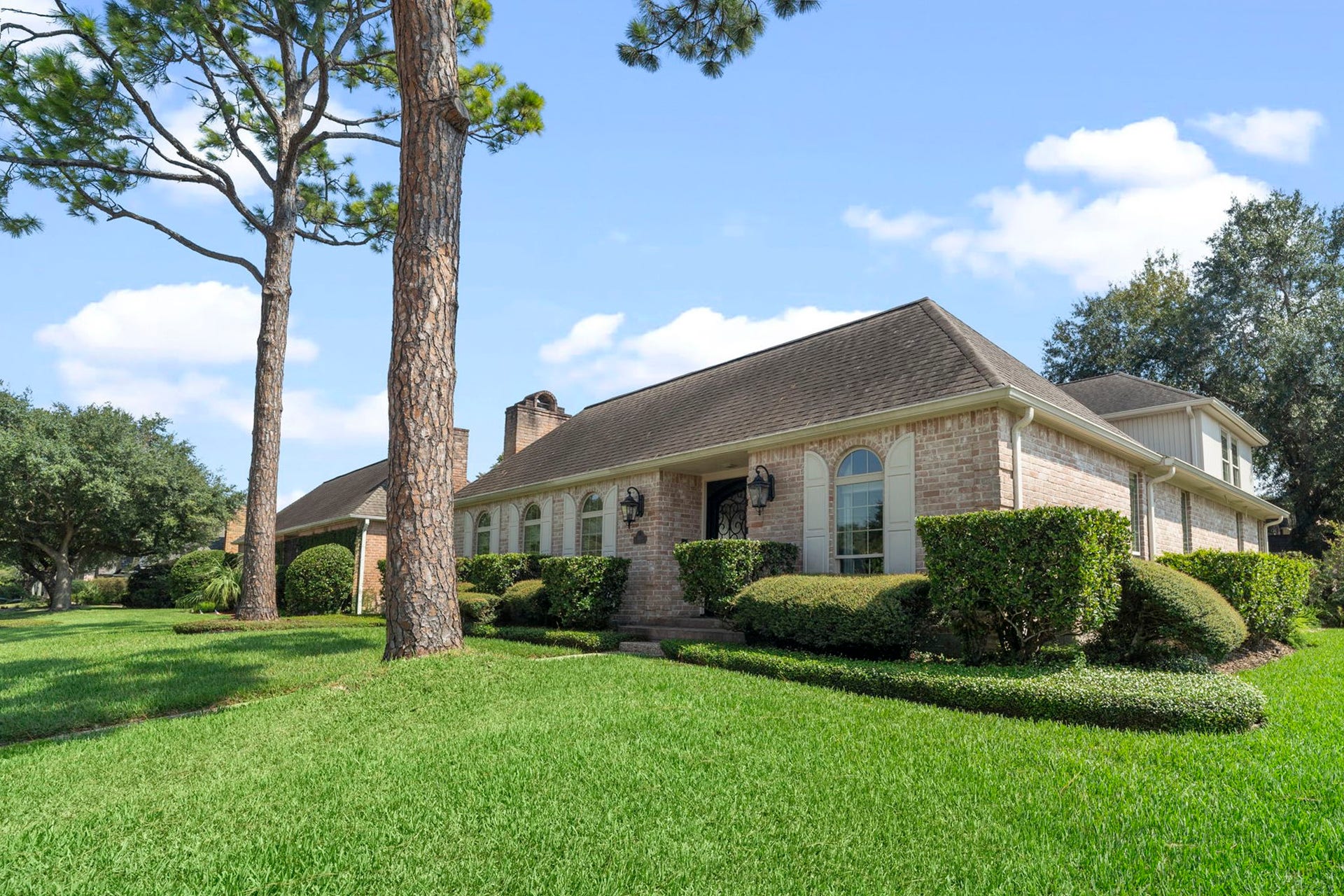 443 Fox Briar Lane, Sugar Land, TX 77478 Step into timeless New Orleans charm in this stunning brick courtyard-style home, beautifully tucked away on a quiet cul-de-sac in desirable Sugar Creek neighborhood.