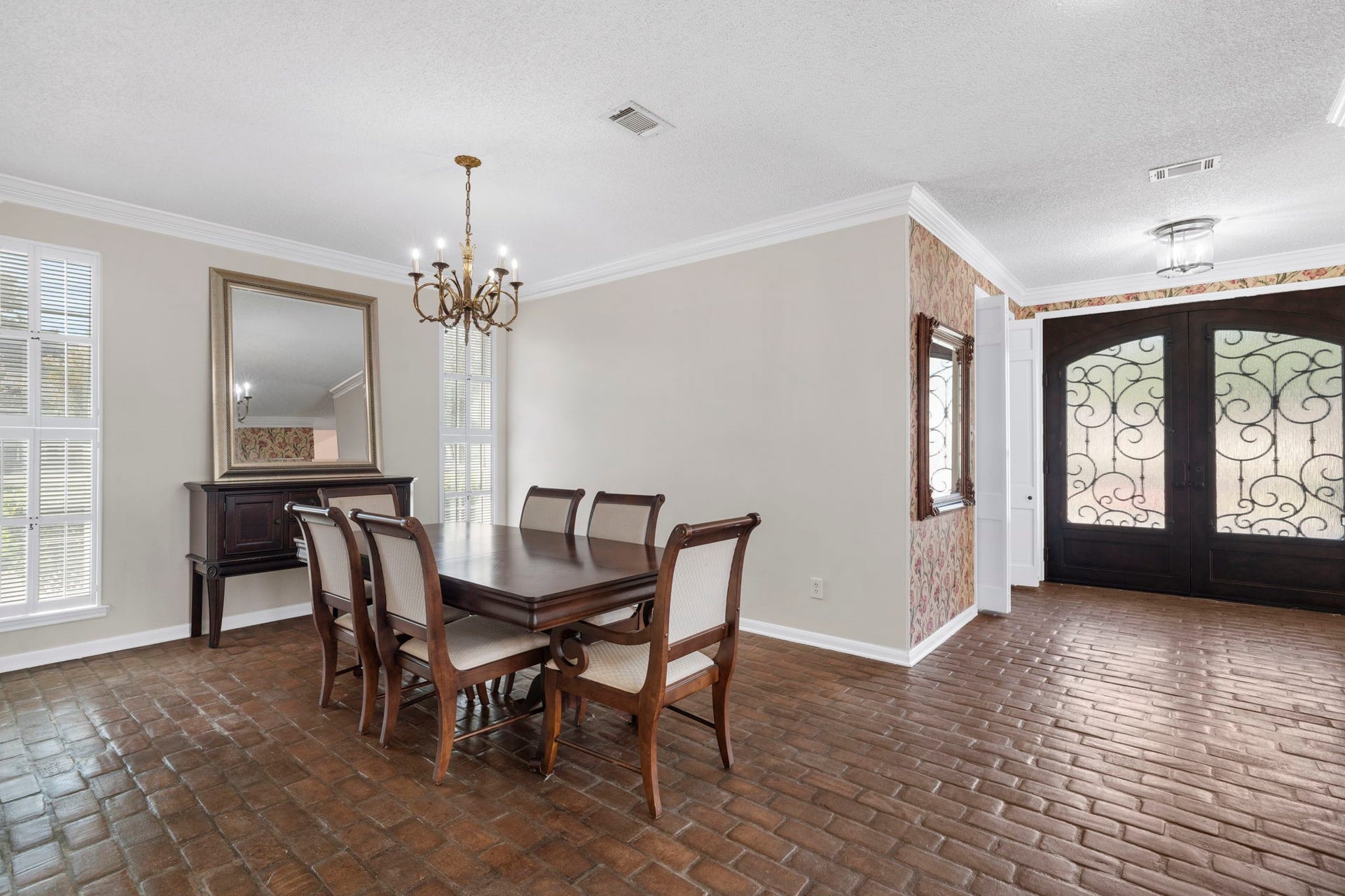 443 Fox Briar Lane, Sugar Land, TX 77478 Gorgeous brick flooring is durable and easy to maintain, making it practical for everyday living.