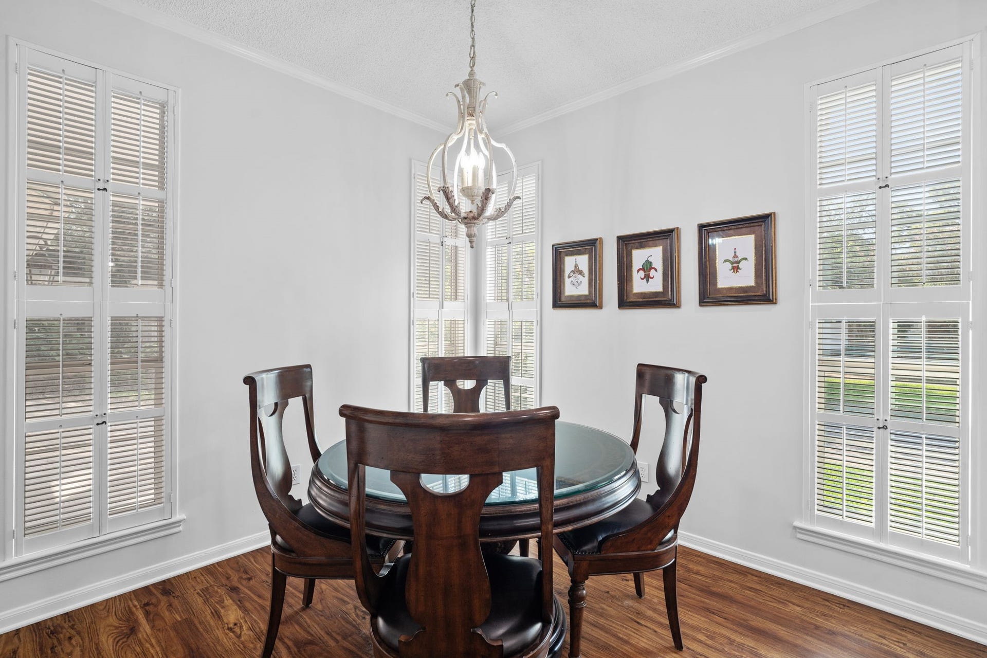 443 Fox Briar Lane, Sugar Land, TX 77478 The light-filled breakfast area is surrounded by windows, creating an inviting space for casual meals.