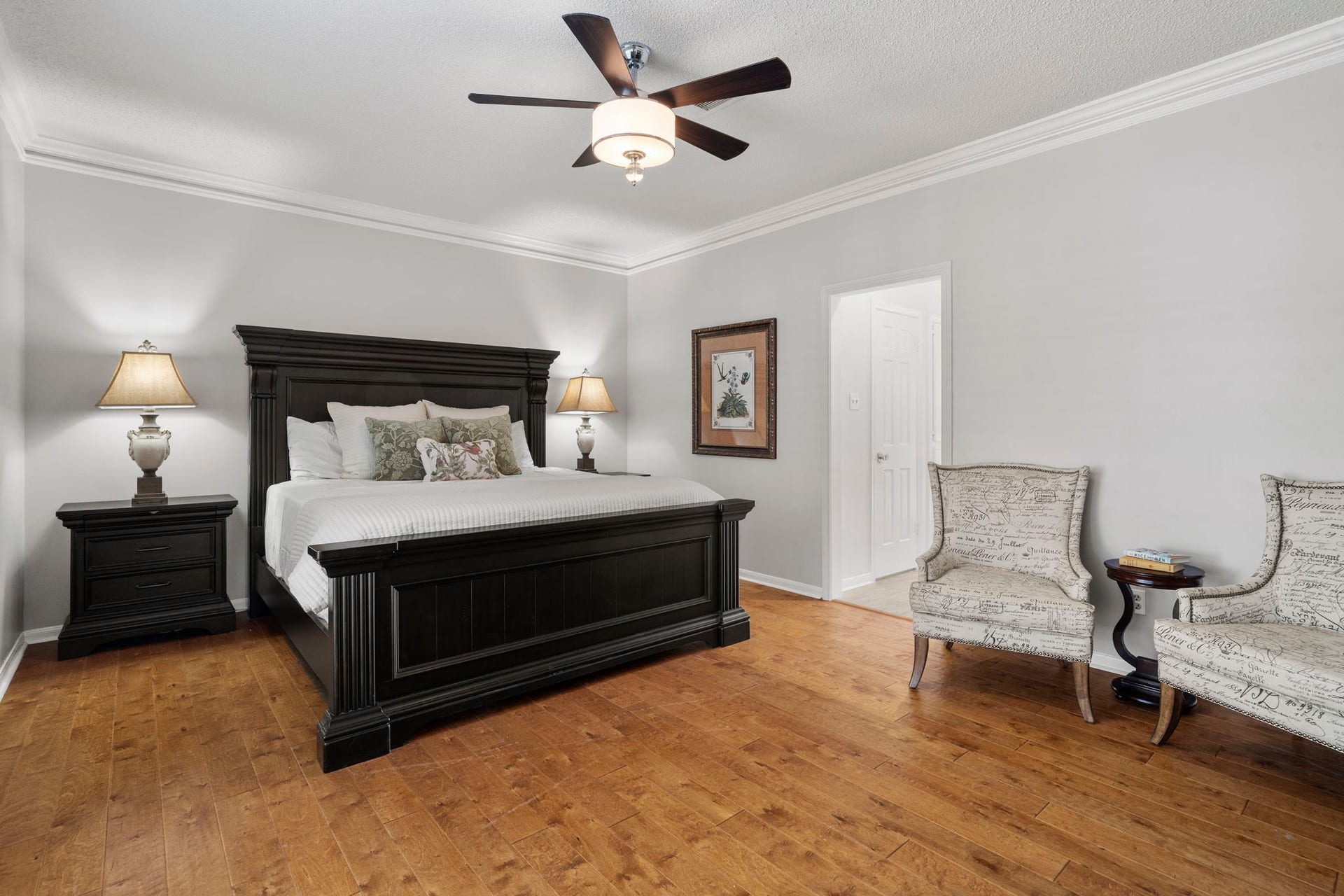 443 Fox Briar Lane, Sugar Land, TX 77478 A serene first-floor owners suite offers an en suite bath, large walk-in closet with two entrances, and private outdoor access to both the courtyard and a secluded patio.