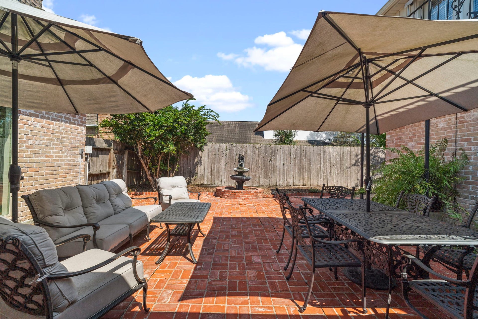 443 Fox Briar Lane, Sugar Land, TX 77478 A quintessential New Orleansstyle brick courtyard creates a private outdoor retreat, framed by timeless brickwork and architectural details.