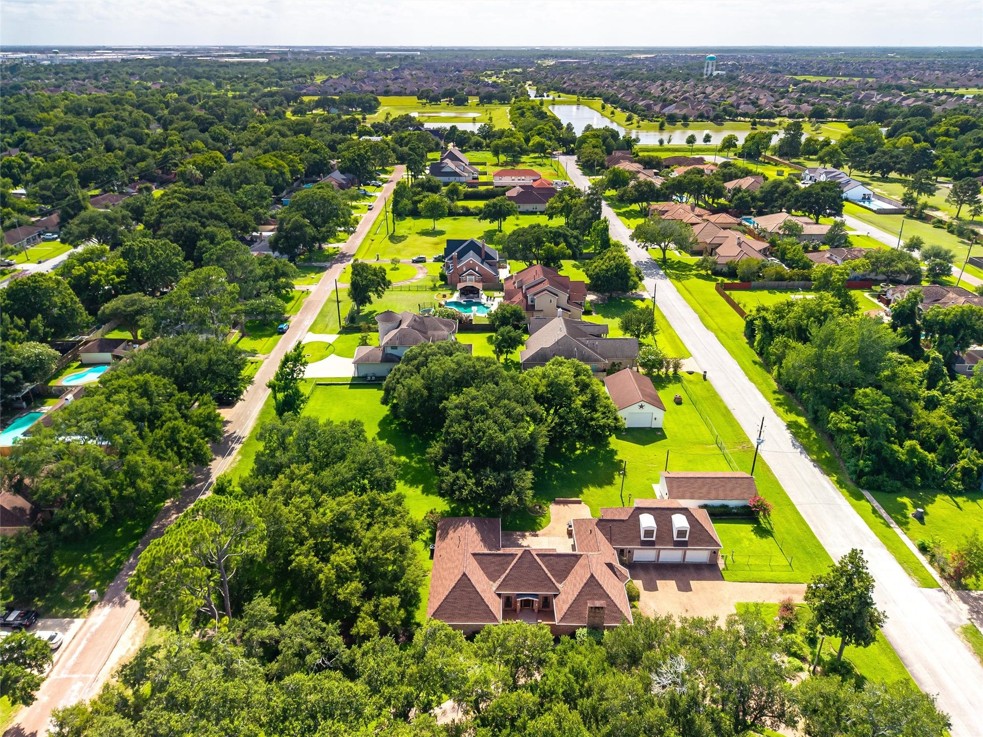 1715 Avenue D, Katy, TX 77493 From above, the home's generous setting and surrounding estate-sized properties reflect the timeless character of this established Old Katy neighborhood.