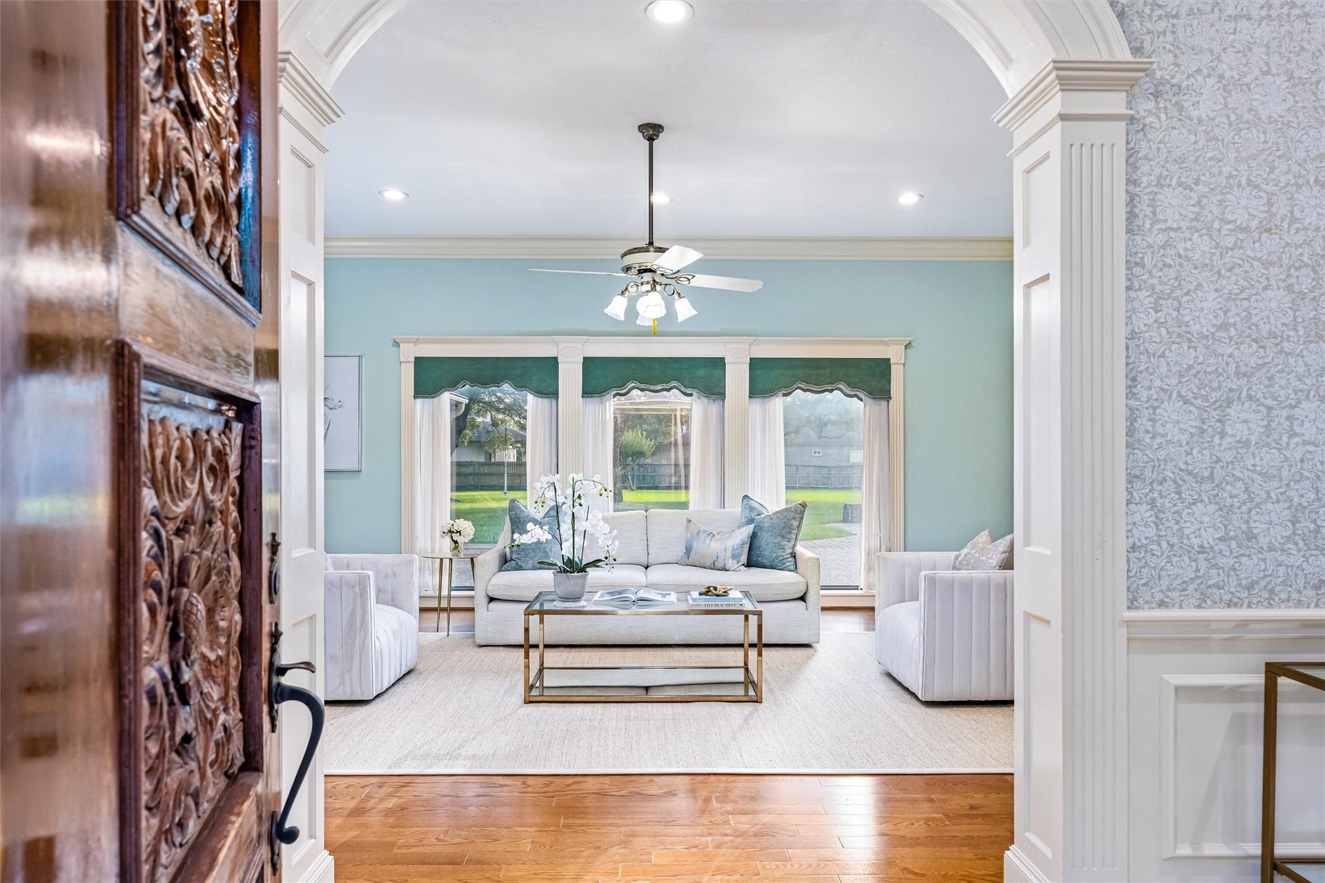 1715 Avenue D, Katy, TX 77493 Architectural columns, intricate millwork and soaring ceilings make a memorable first impression.