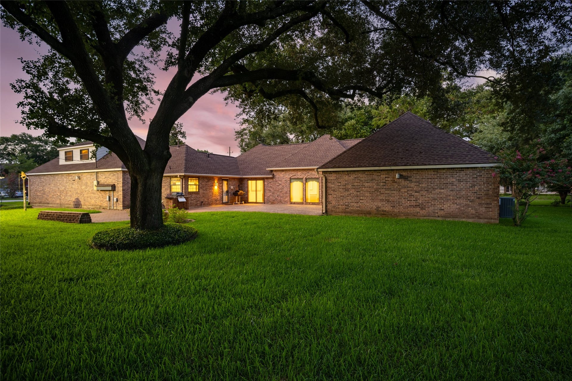 1715 Avenue D, Katy, TX 77493 Twilight looks good with the sunsets that await you!